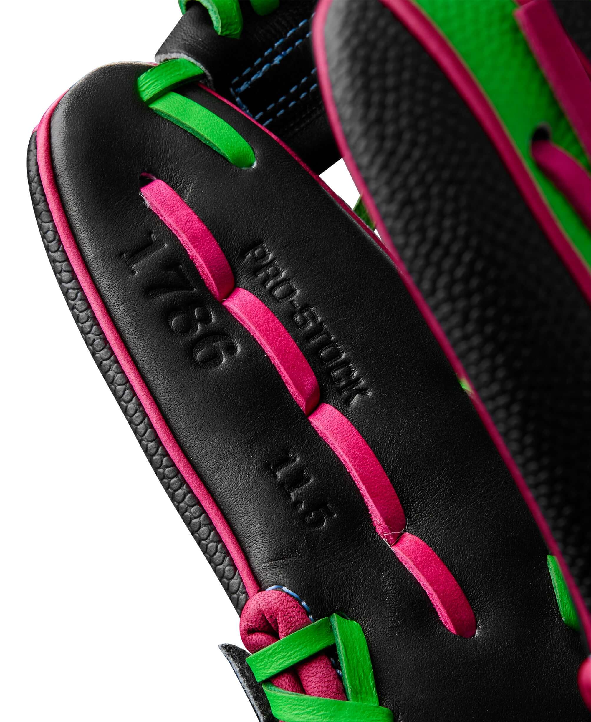 Close-up of Wilson A2000 1786 11.5" baseball glove showcasing black and neon green design.