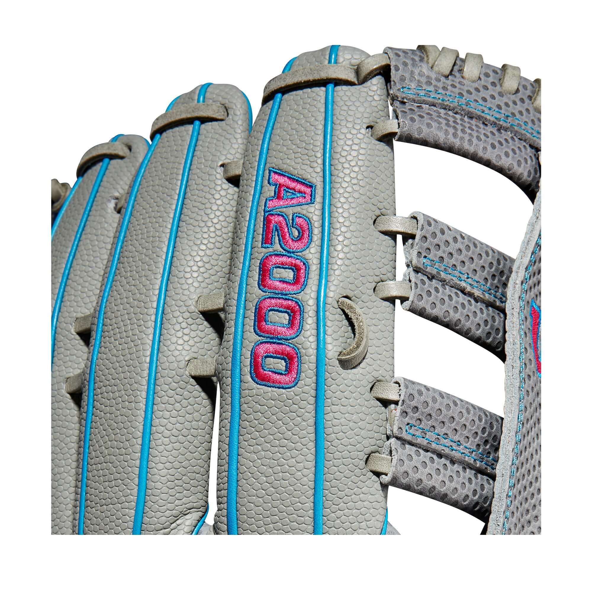 Close-up of Wilson A2000 SCSP13SS glove showcasing Grey Pro Stock leather and blue stitching details.