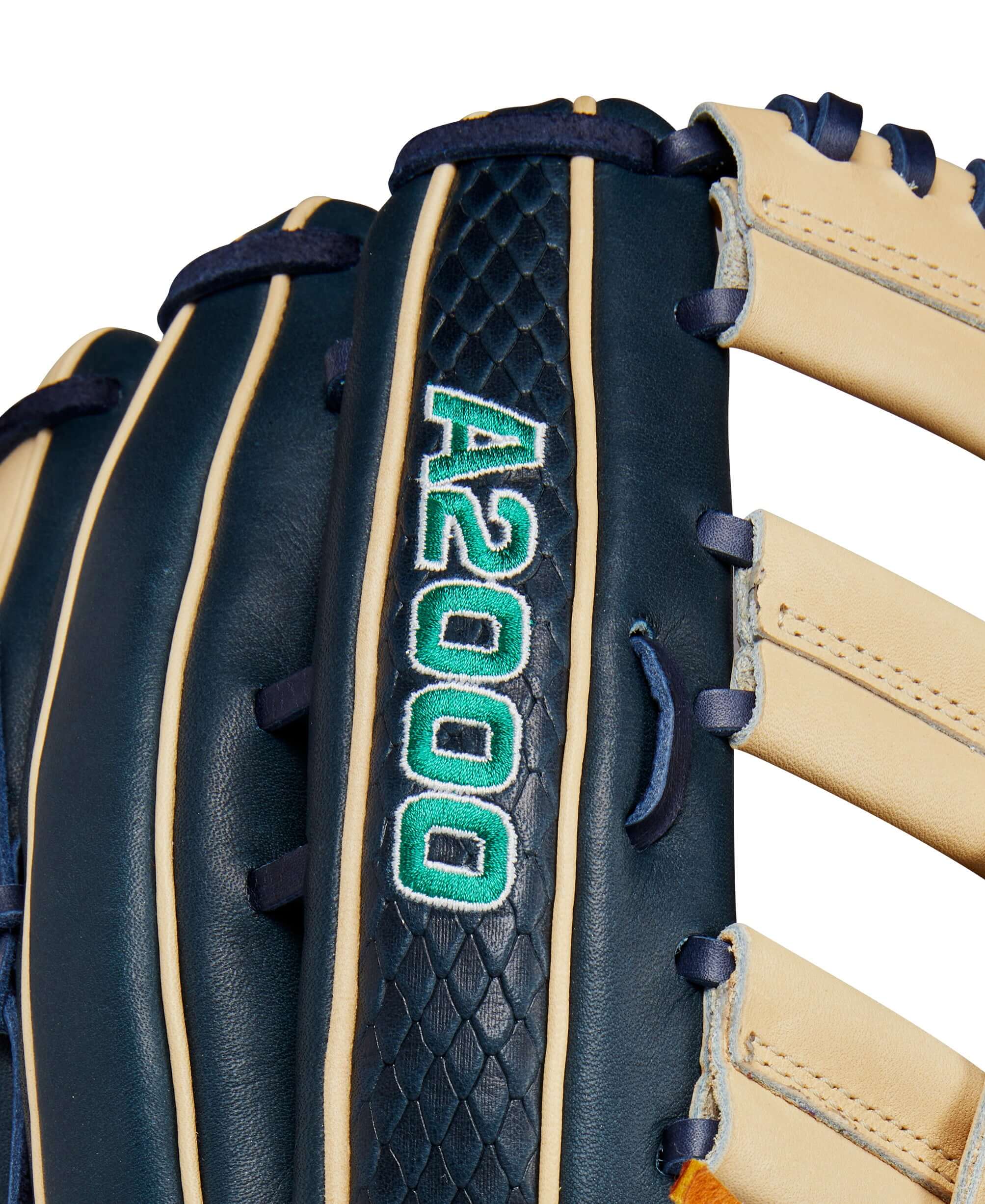 Close-up of Wilson A2000 glove showing navy blue and blonde leather with A2000 embroidered label.