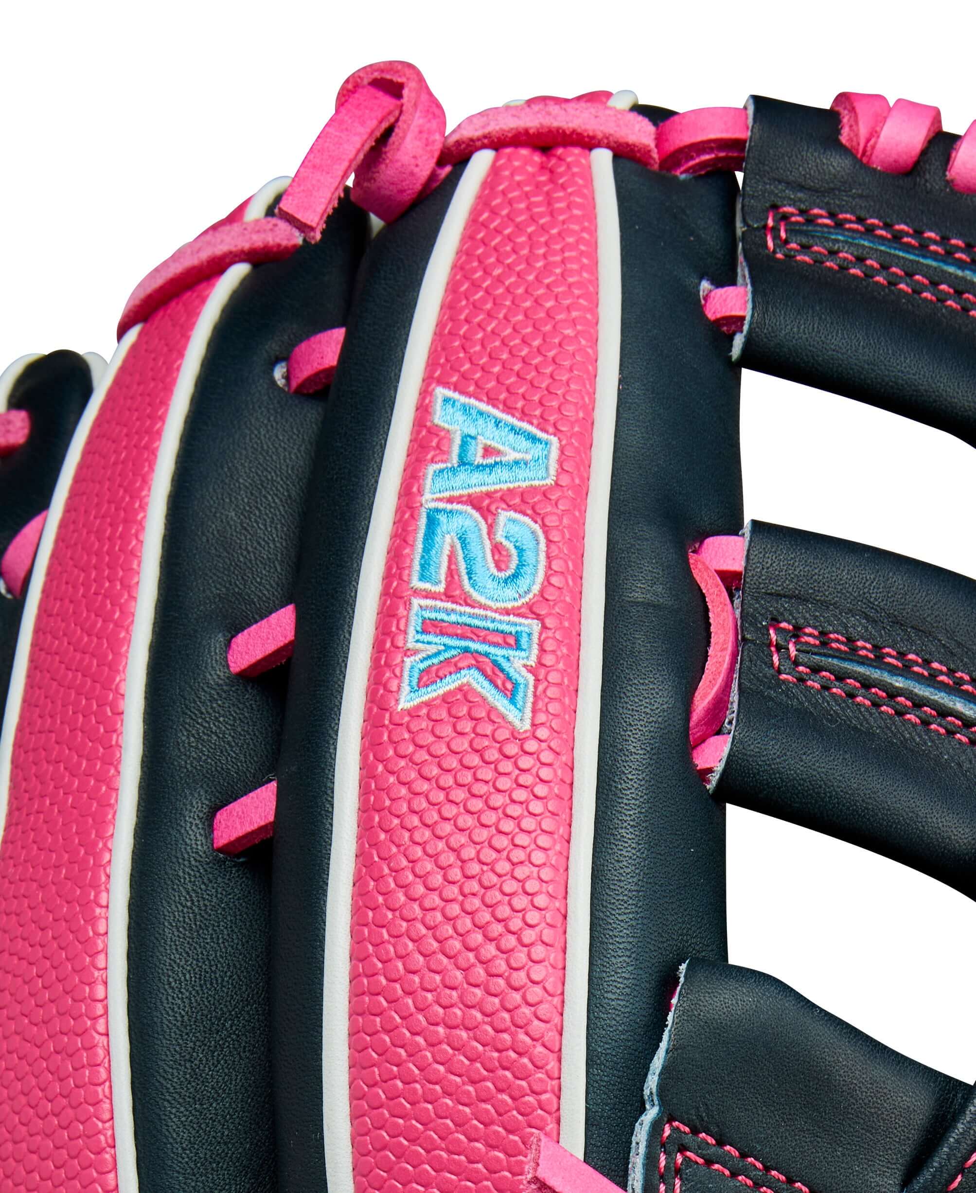 Close-up of A2K logo on fingers with precise stitching on Navy Blue leather for quality assurance."