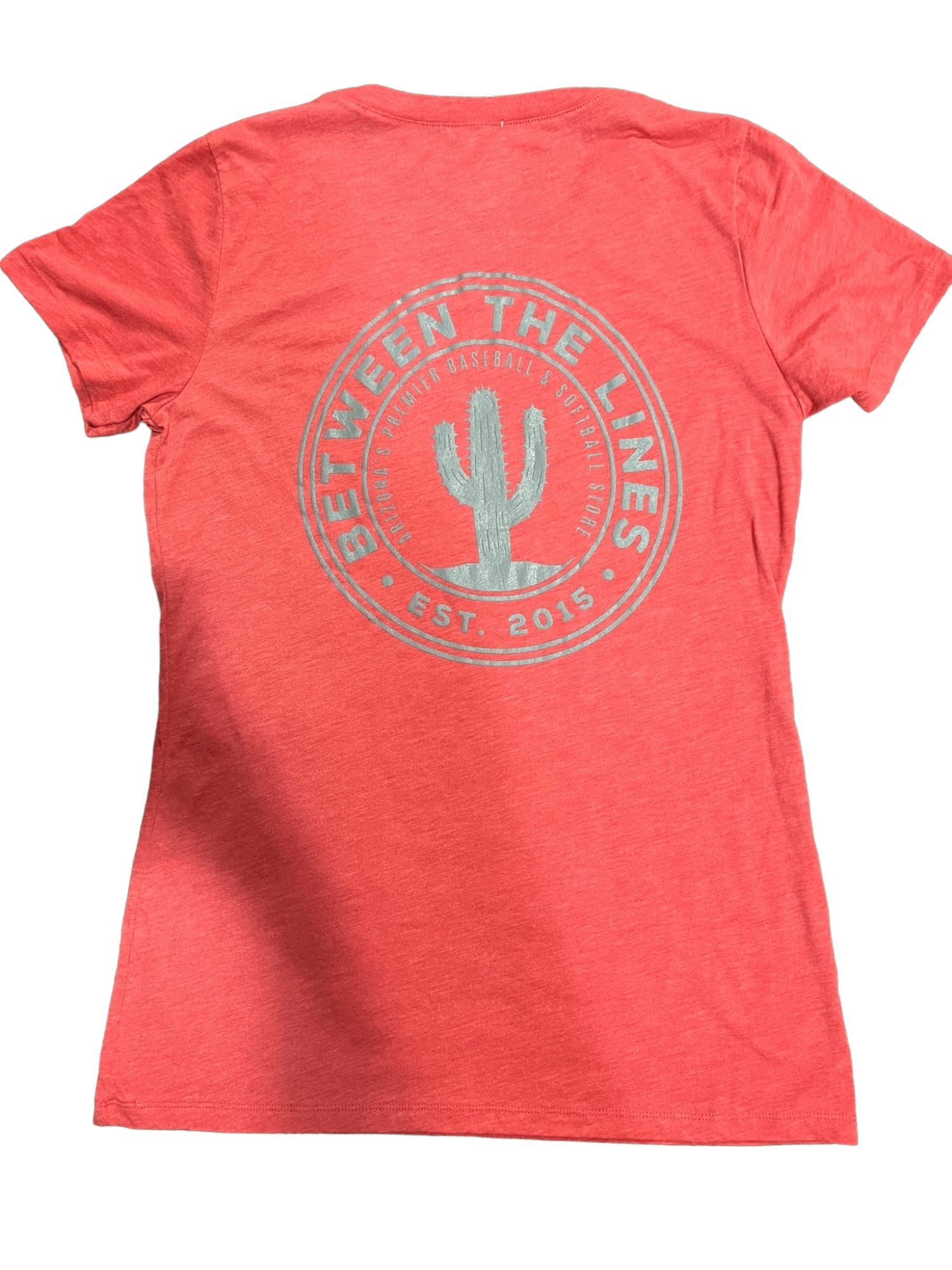 Red Between The Lines Women's Cactus T-Shirt featuring a stylish round neckline and trendy cactus logo on the back.