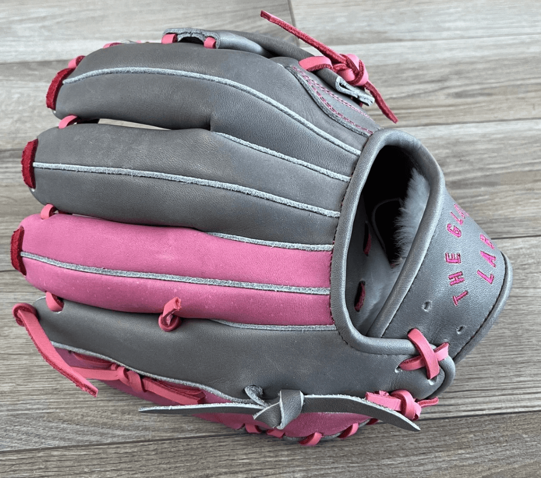 Youth 10.75' glove from The Glove Lab with pink accents, designed for players 10u and younger.