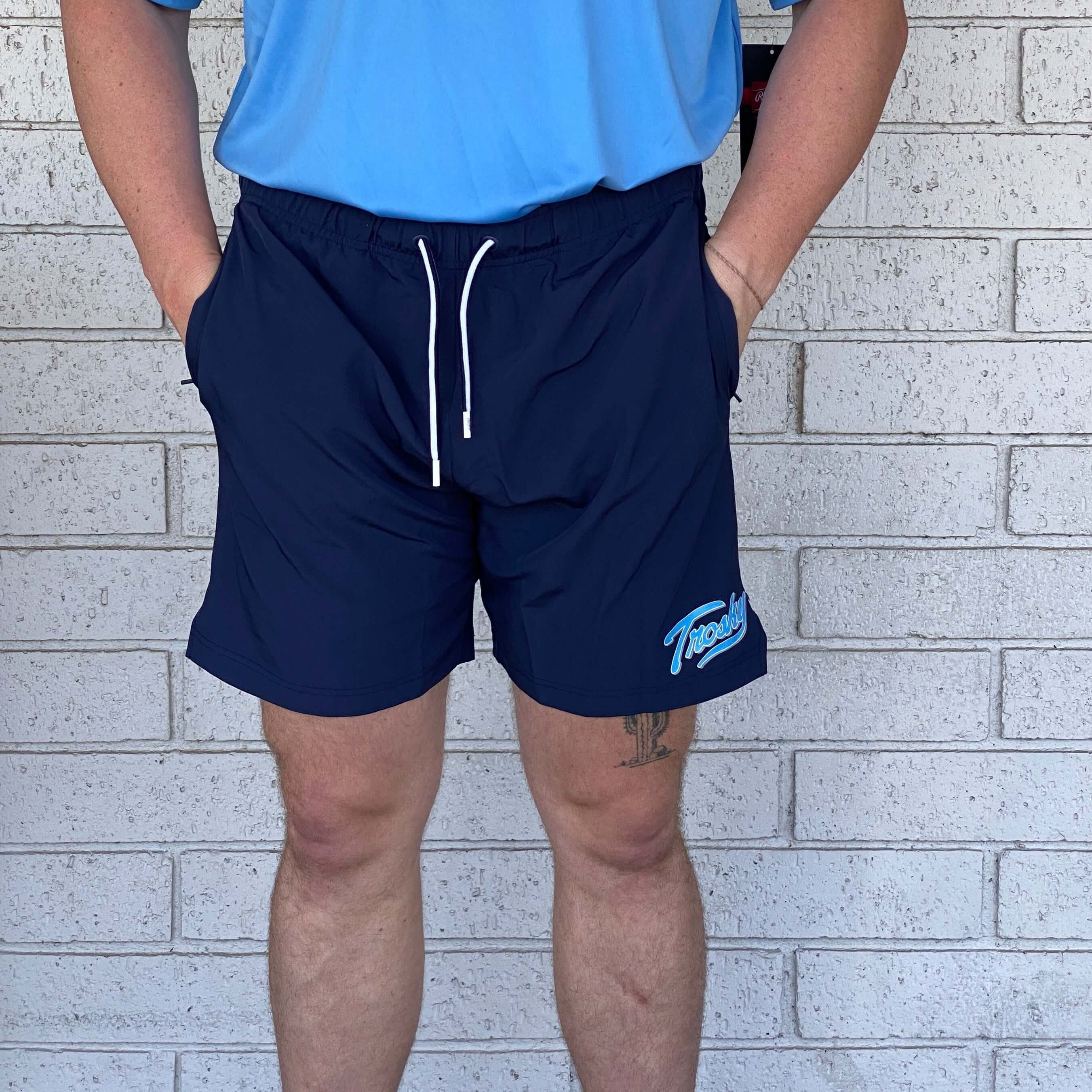 Rawlings Trosky Navy Shorts for men, featuring a comfortable fit and side pockets, perfect for athletic wear.
