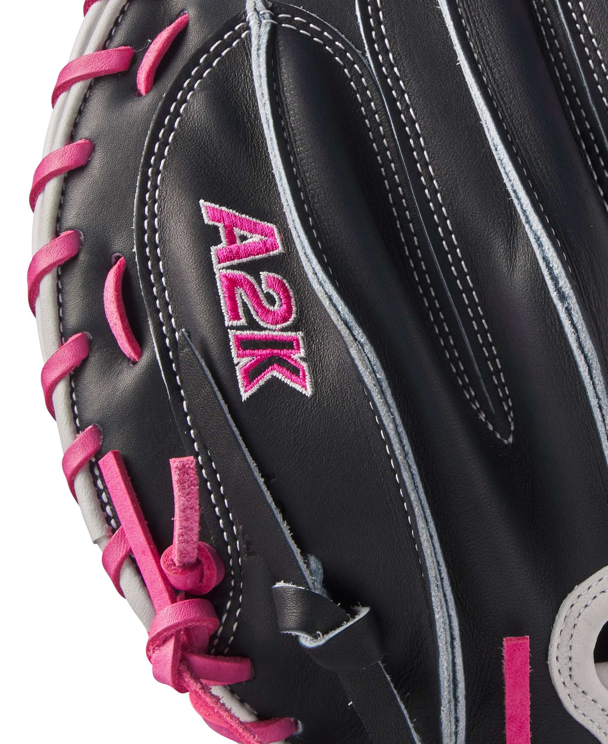 Close-up of Wilson A2K catcher's mitt showcasing black Pro Stock leather and pink accents, perfect for modern catchers.