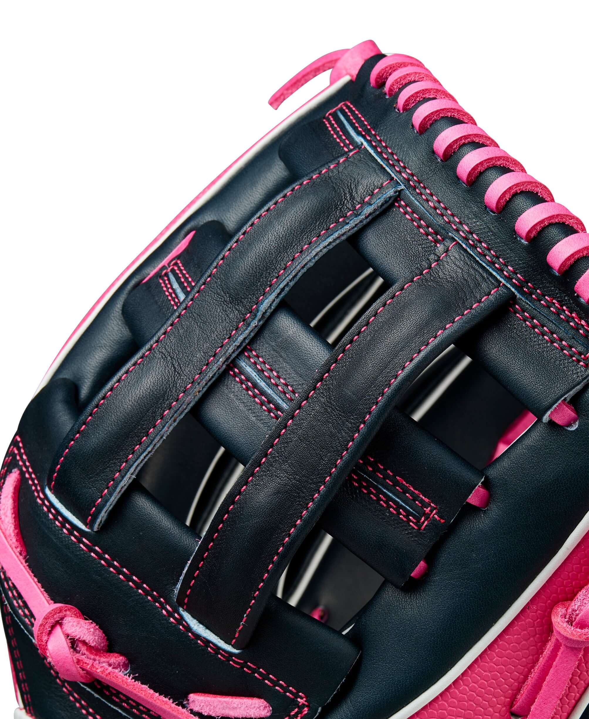 Detailed image of the Dual Post Web on Wilson A2K 1750 for swift ball collection and control.