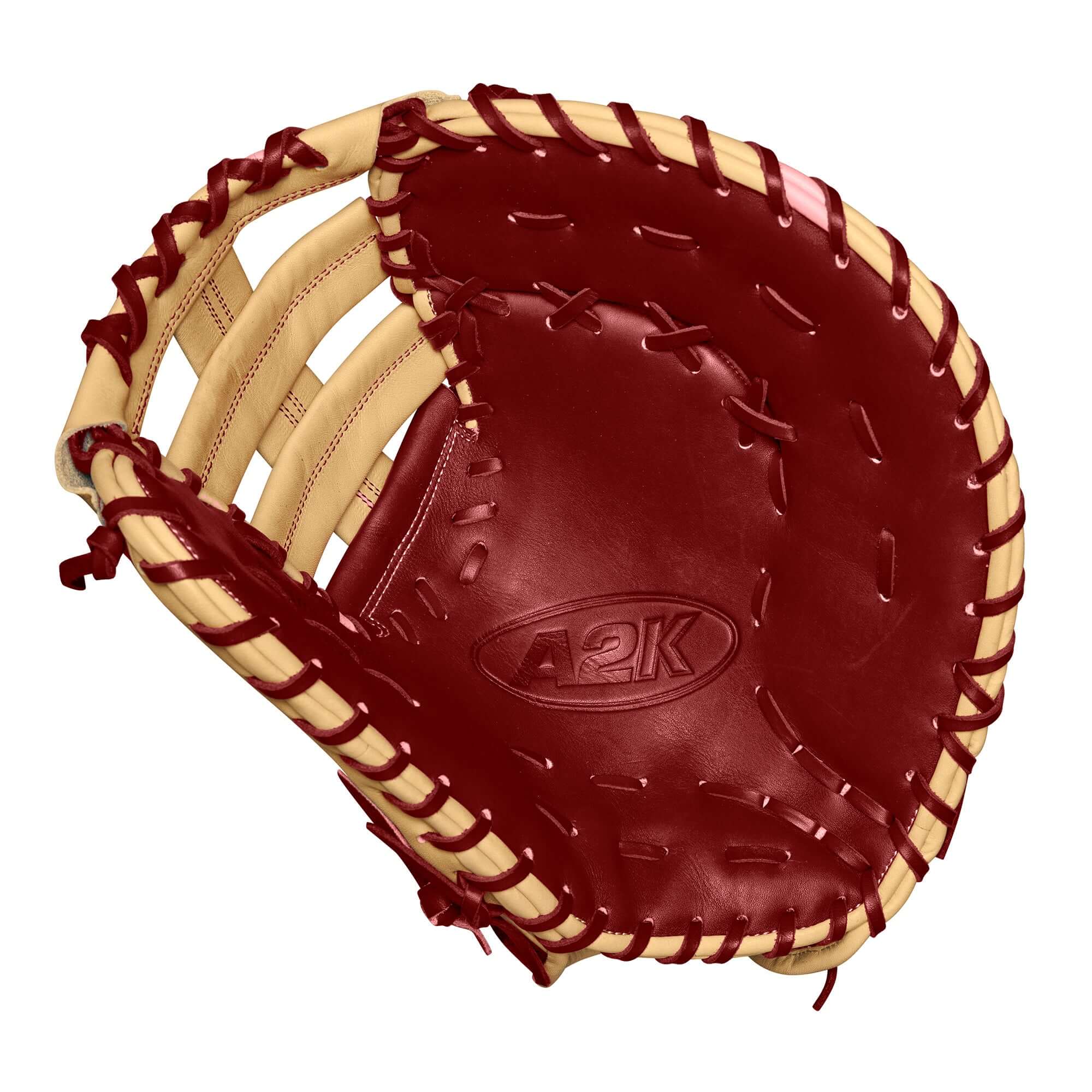 Wilson A2K 1679 baseball first base mitt in blonde and brick red leather, showcasing craftsmanship and flexibility.