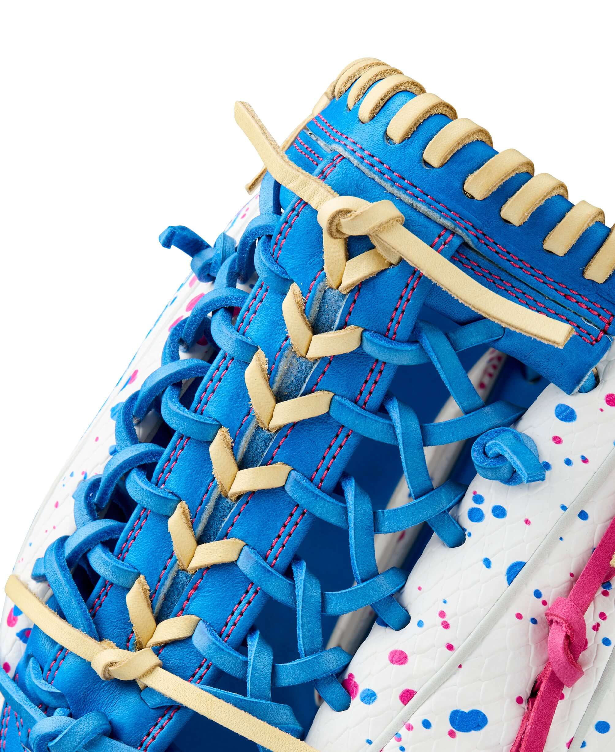 Close-up of Wilson 2025 Love the Moment A2000 T125SS glove showing colorful lacing and Autism Speaks Blue leather.