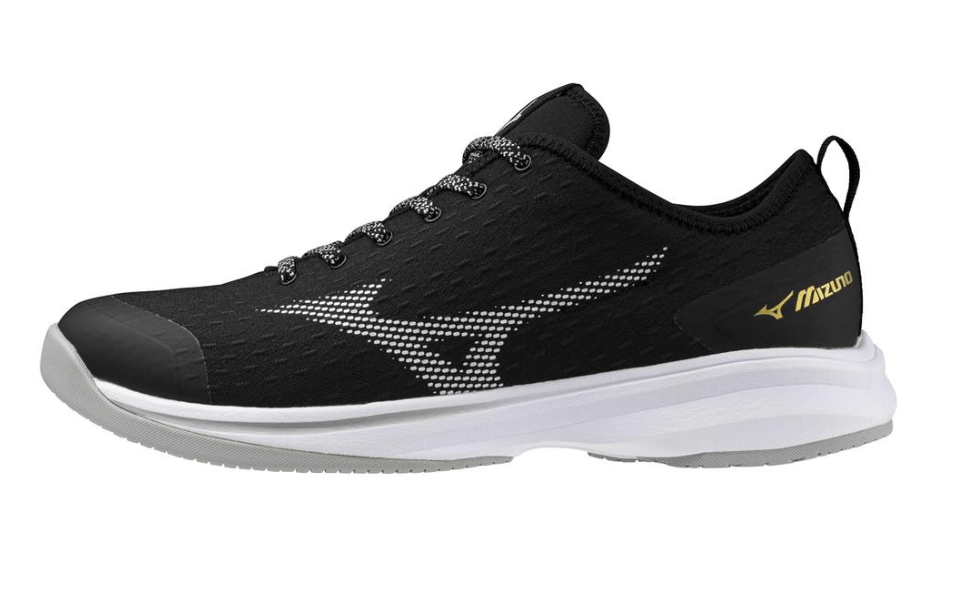 Mizuno Dominant 4 Low Turf shoe in black with breathable upper and G3 sole for enhanced comfort and performance.