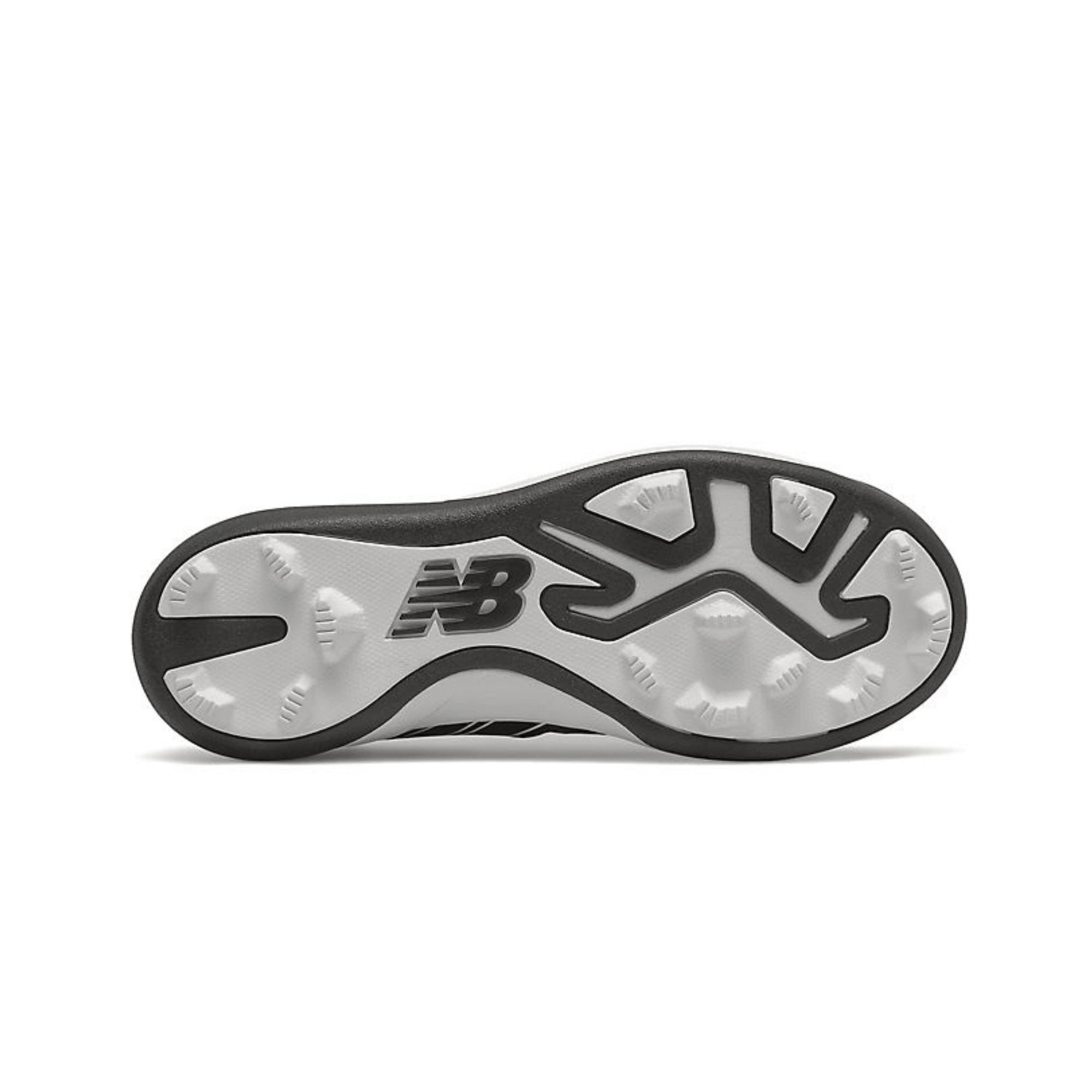 Bottom view of New Balance J4040v6 kids' baseball cleat, showcasing rubber molded traction features.
