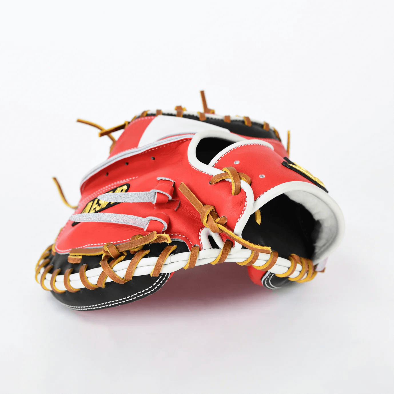 Backhand view of All-Star Pro-Elite Japan 34" Catchers Mitt Open Back Red/Black/White with tan lacing and wrist opening.