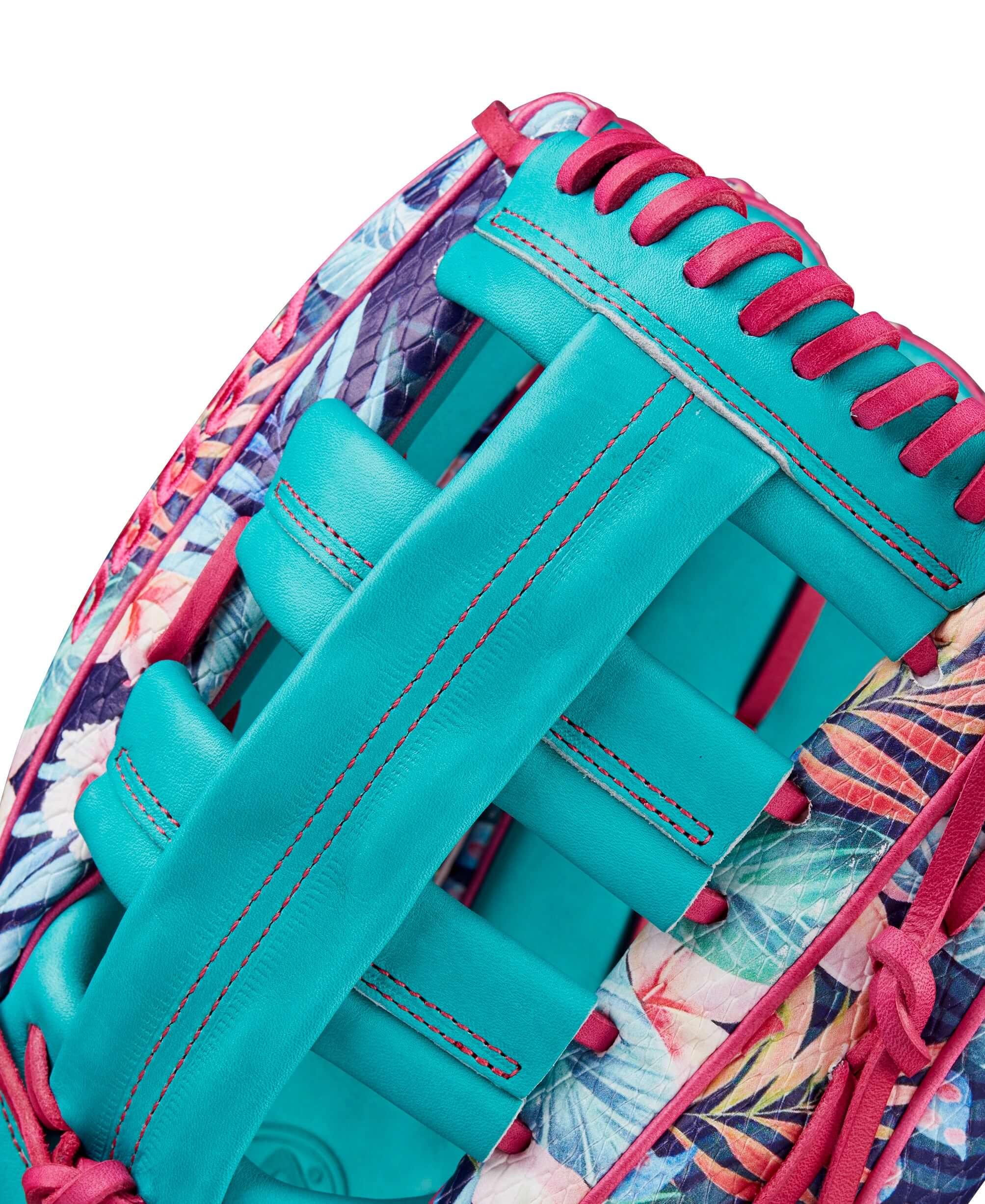 Close-up of Wilson A2000 Randy Arozarena glove featuring floral print and teal leather details.