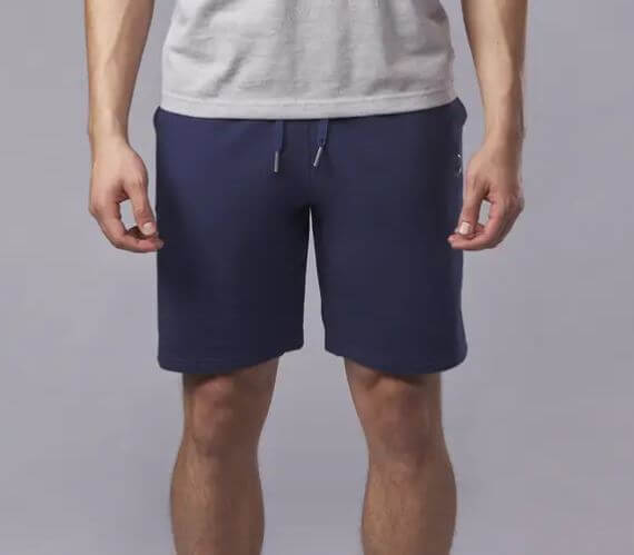 Front view of Evoshield Pro Team Clubhouse Shorts in navy blue, showcasing elastic waistband with drawcord.