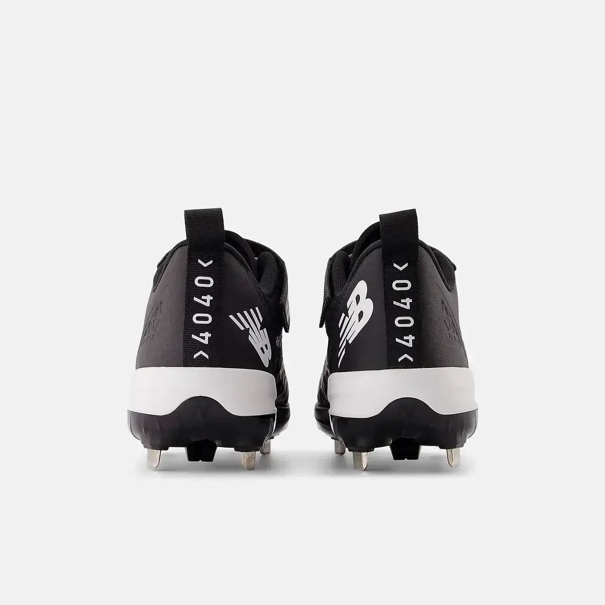 New Balance FuelCell 4040 V8 Cleats | Black, heel view with stud pattern and logo detailing