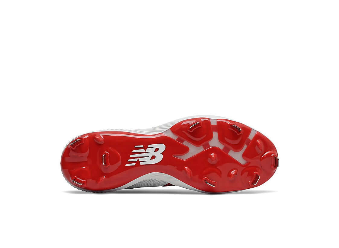 Bottom view of New Balance FuelCell 4040v6 baseball shoe featuring a red metal spike cleat design.