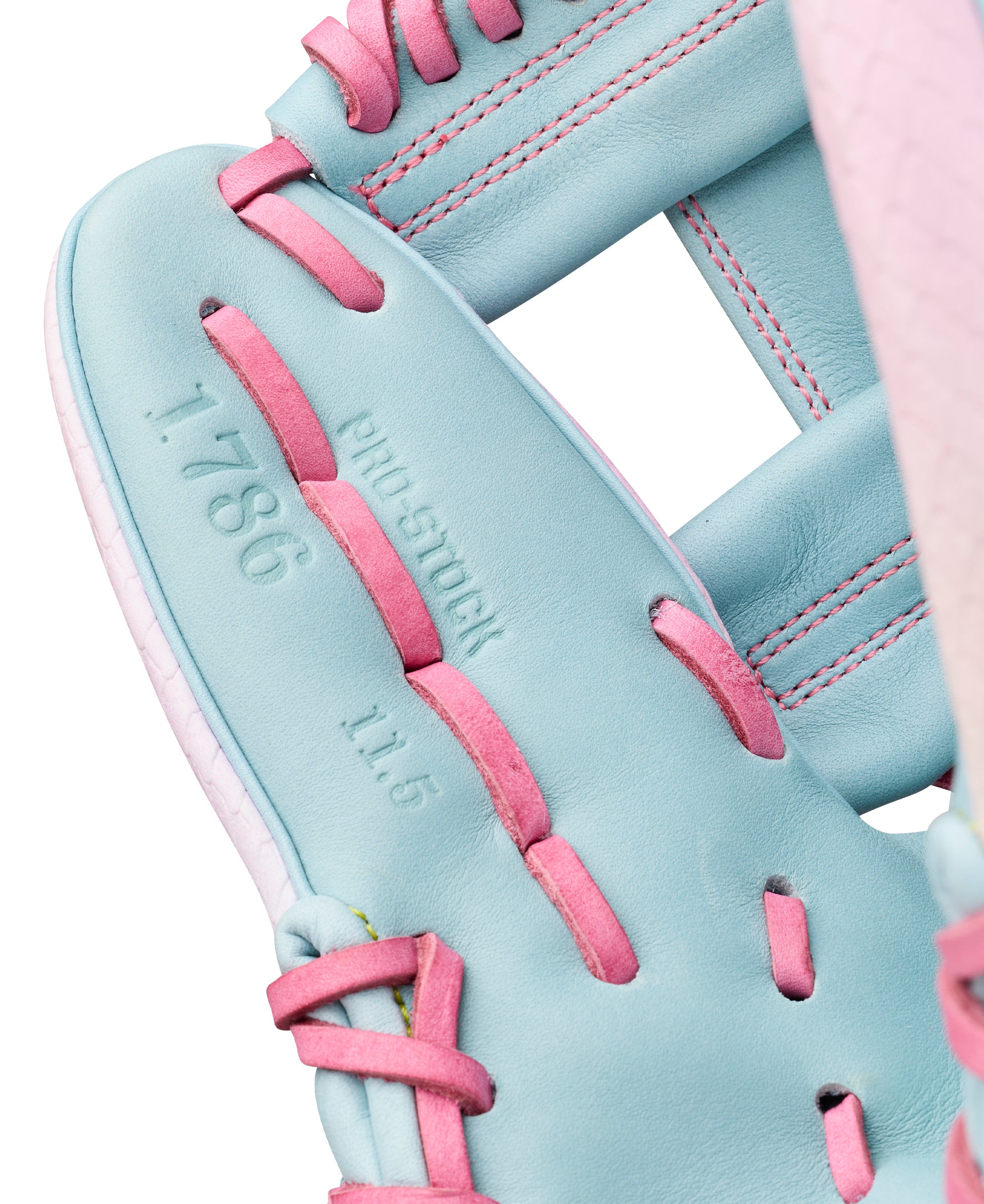 Close-up of Wilson A2000 1786 11.5" April 2026 GOTM Pastel Clouds Infield Glove with pastel pink laces.