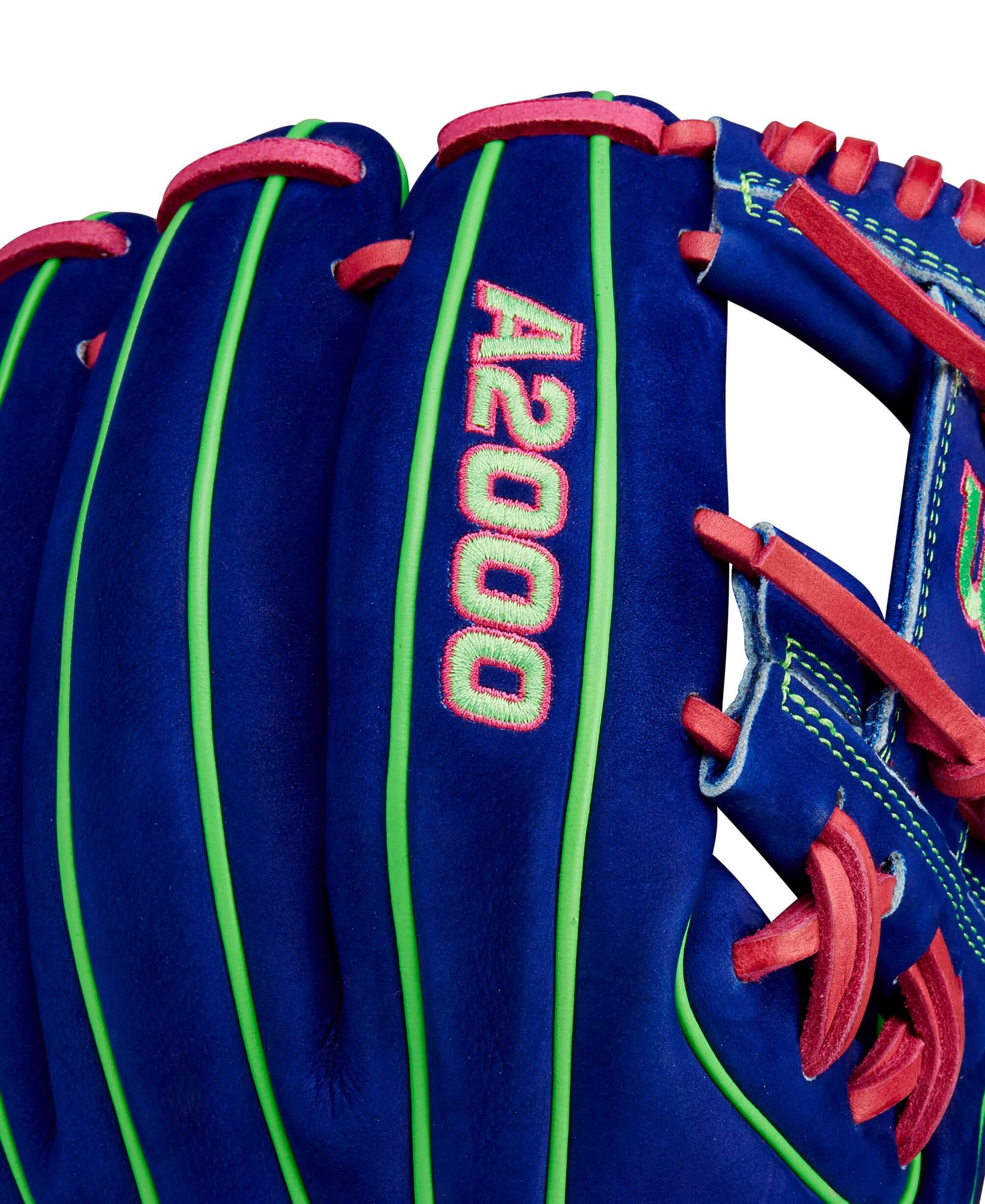 Close-up of Wilson A2000 January 2024 glove in blue velvet with Neon Green and Flamingo Pink accents.