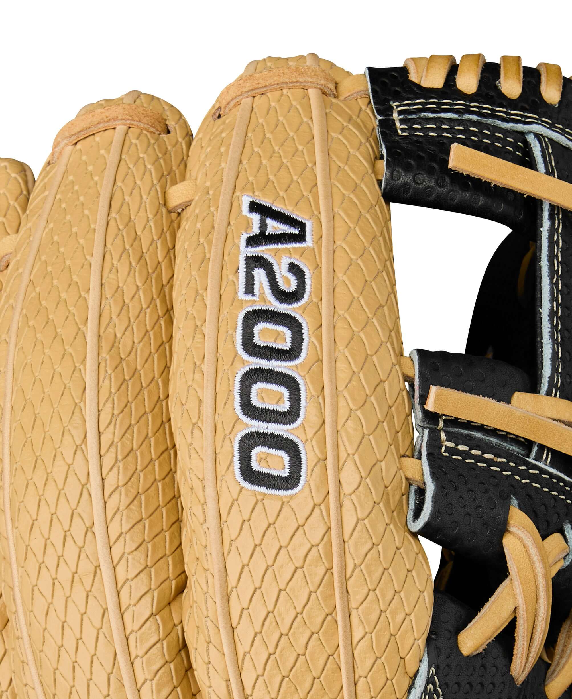 "Close-up of A2000 logo on fingers, ensuring premium quality with iconic branding on Pro Stock® leather.