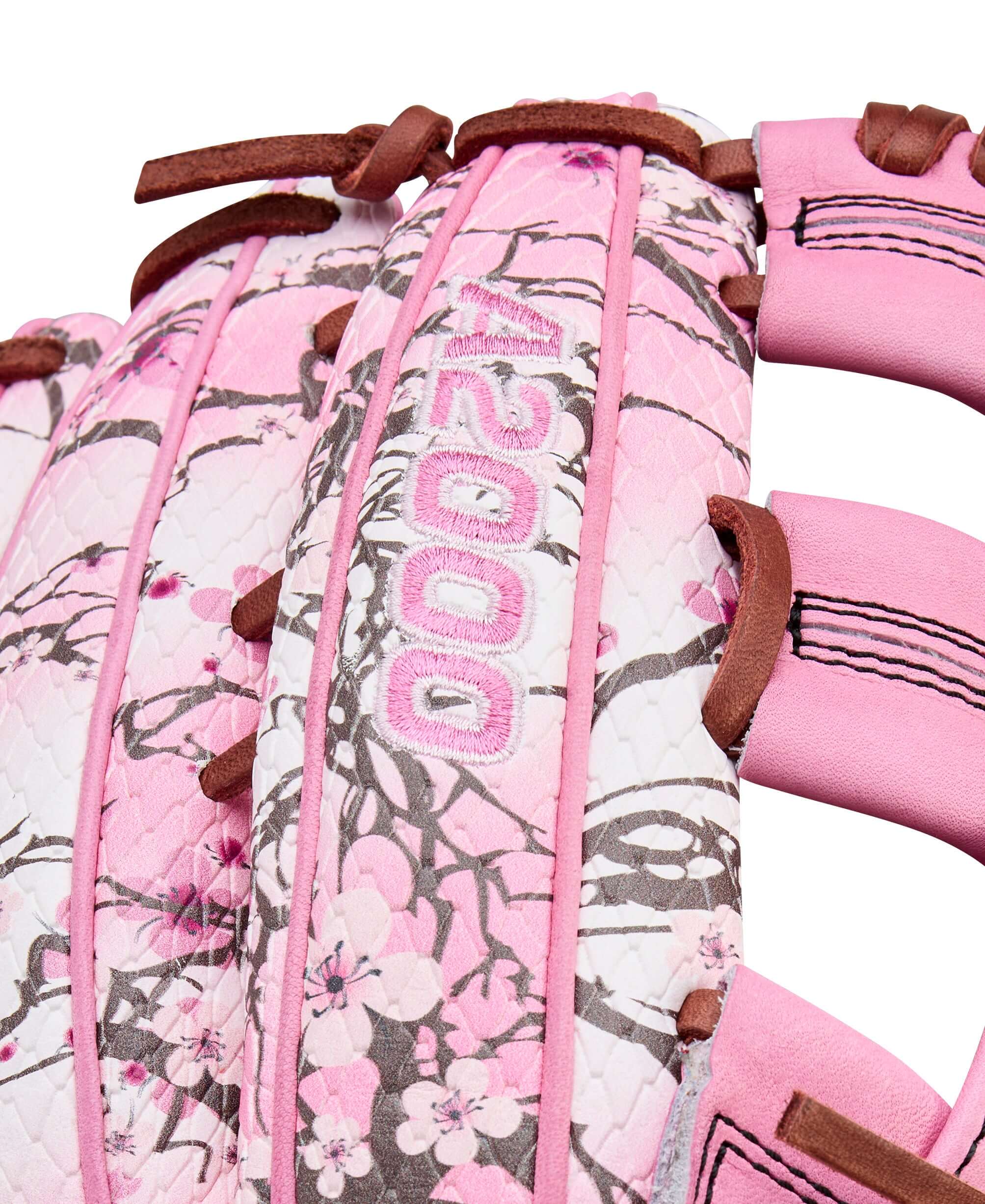 Wilson A2000 1799 MJ Melendez GM baseball glove, September 2025 edition, featuring pink floral design.