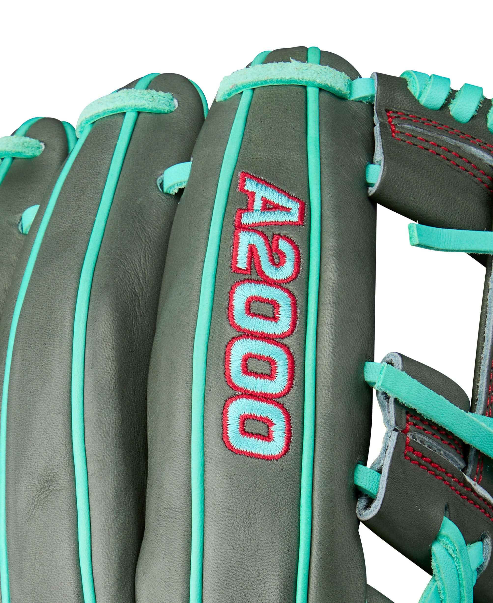 Close-up of Wilson A2000 1975 infield baseball glove showing Coal and Seafoam colors, highlighting its Pro Stock leather.