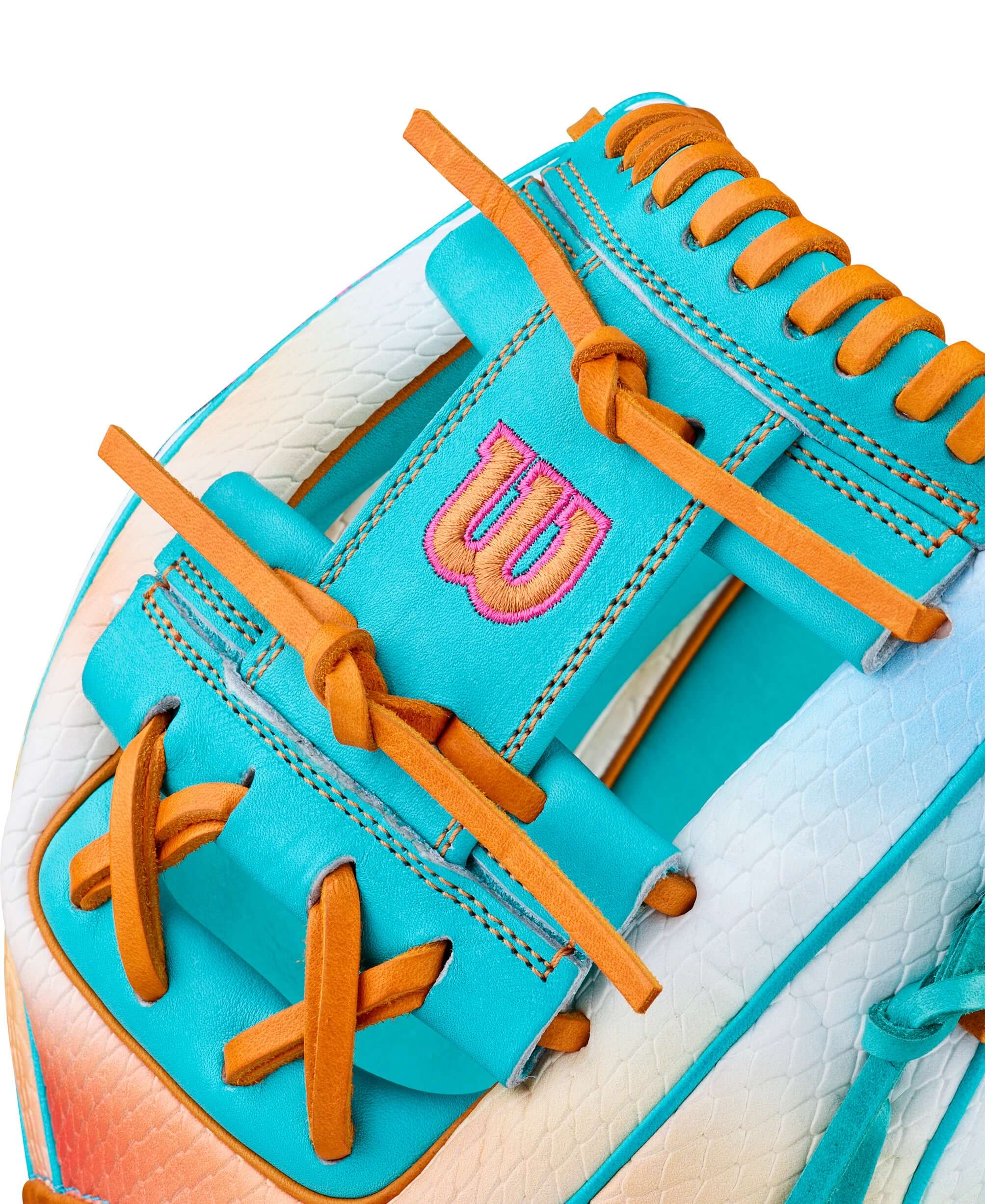Close-up of Wilson A2000 1975S infield baseball glove with stylish turquoise and orange details.