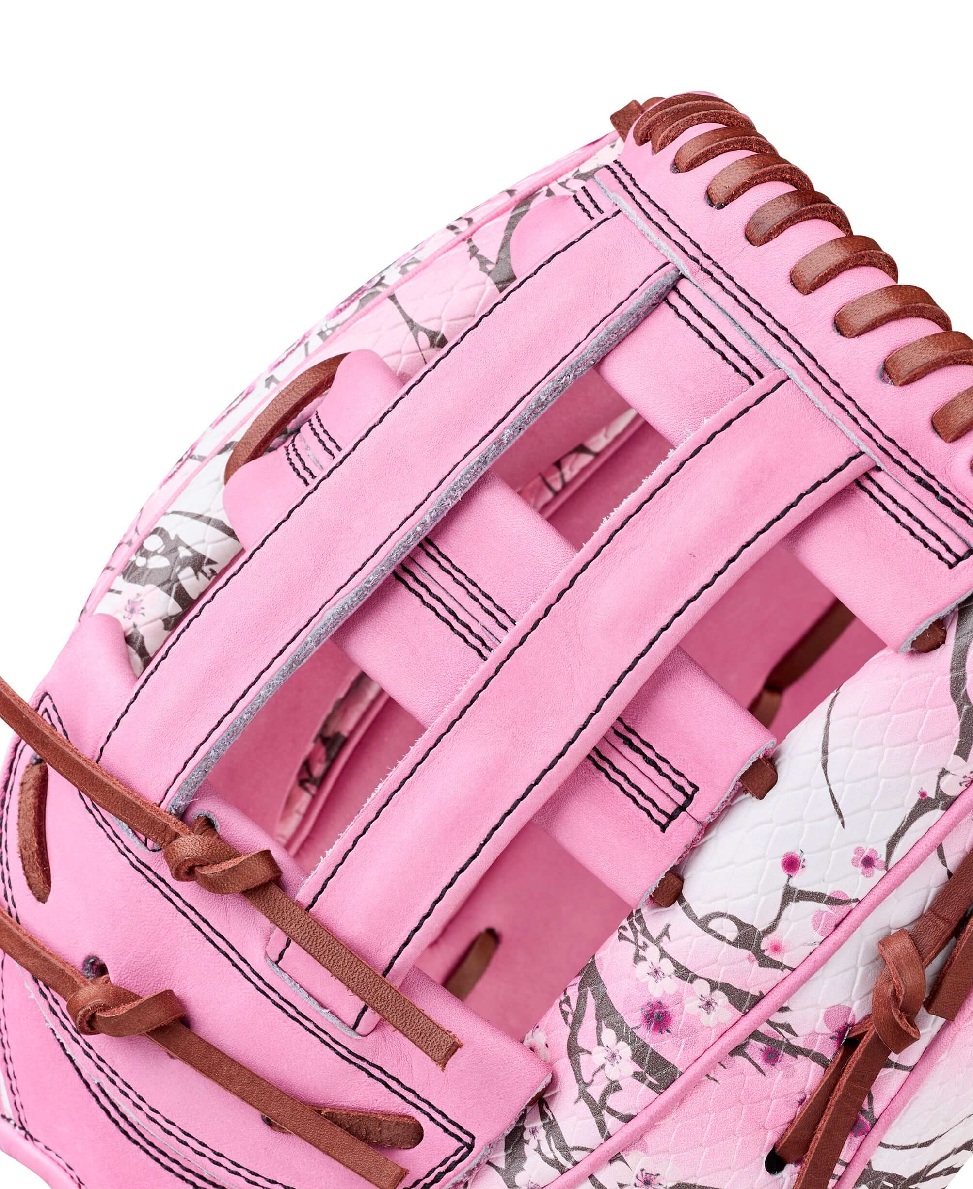Close-up of the Wilson Glove of the Month September 2025 A2000 1799 MJ Melendez GM pink baseball glove design.