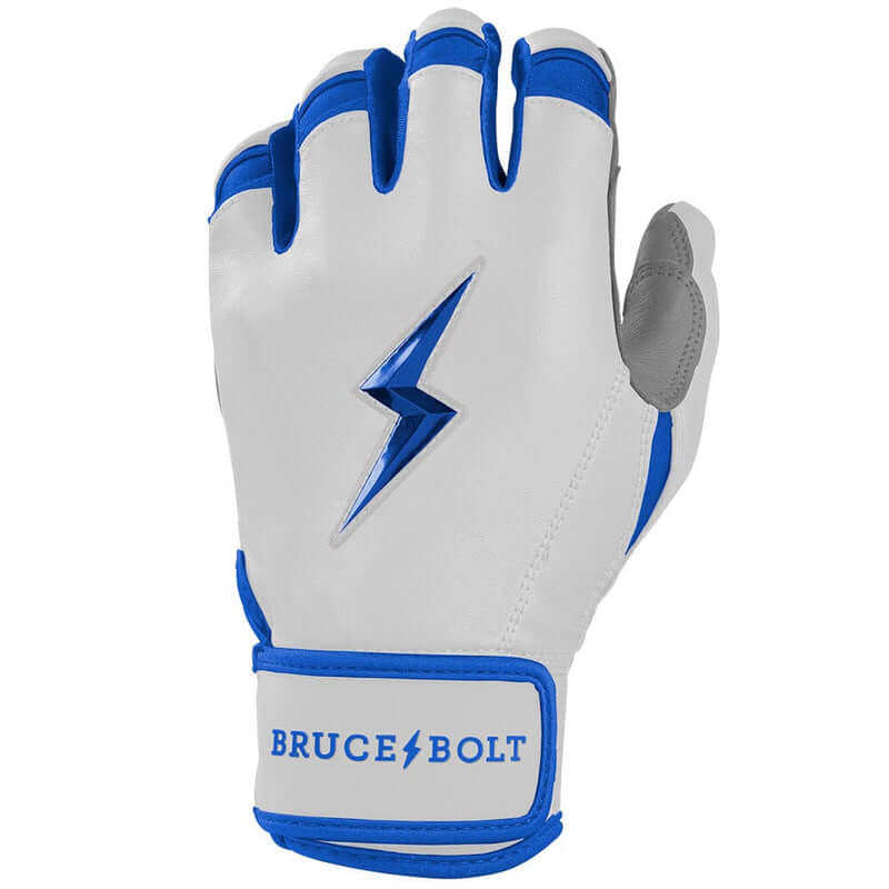 Left hand Bruce Bolt Youth Royal batting glove showing short cuff and premium finish.