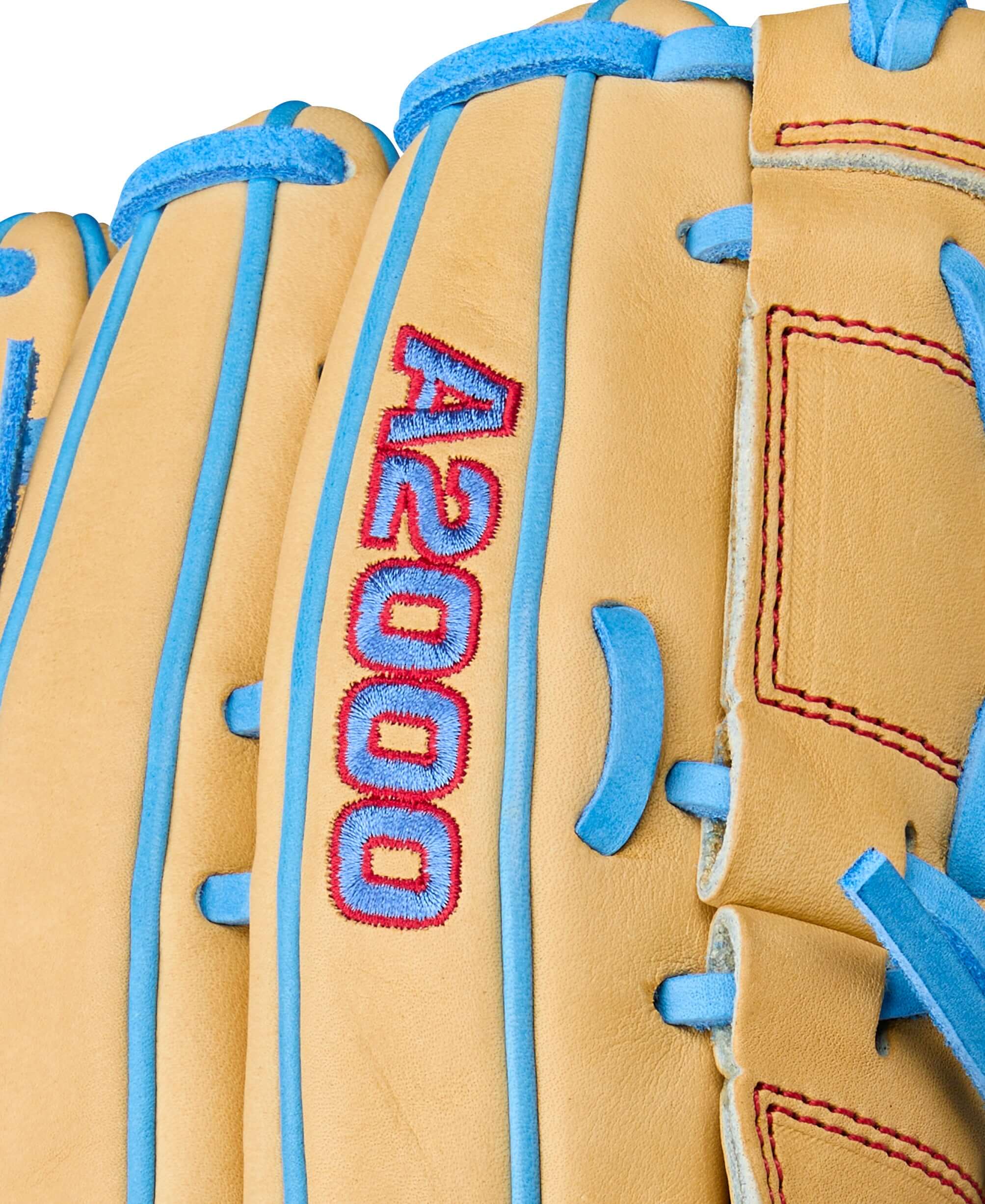 Close-up of Wilson A2000 B125 baseball glove showing Blonde leather and Sky Blue accents.