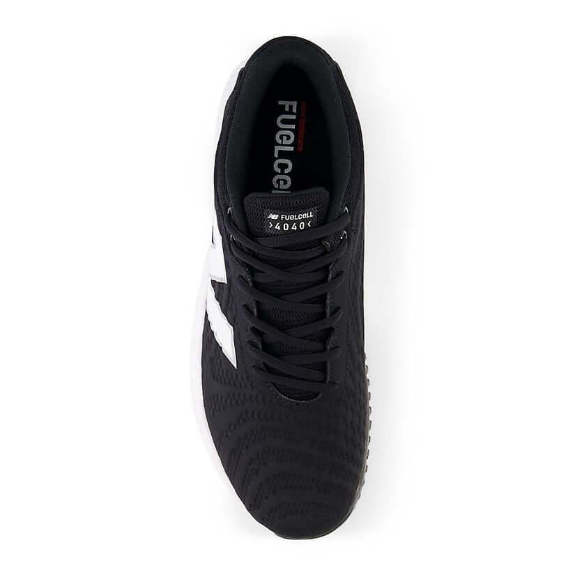 New Balance FuelCell 4040v7 Turf Trainer in black, featuring a sleek design and comfortable fit for ballplayers.