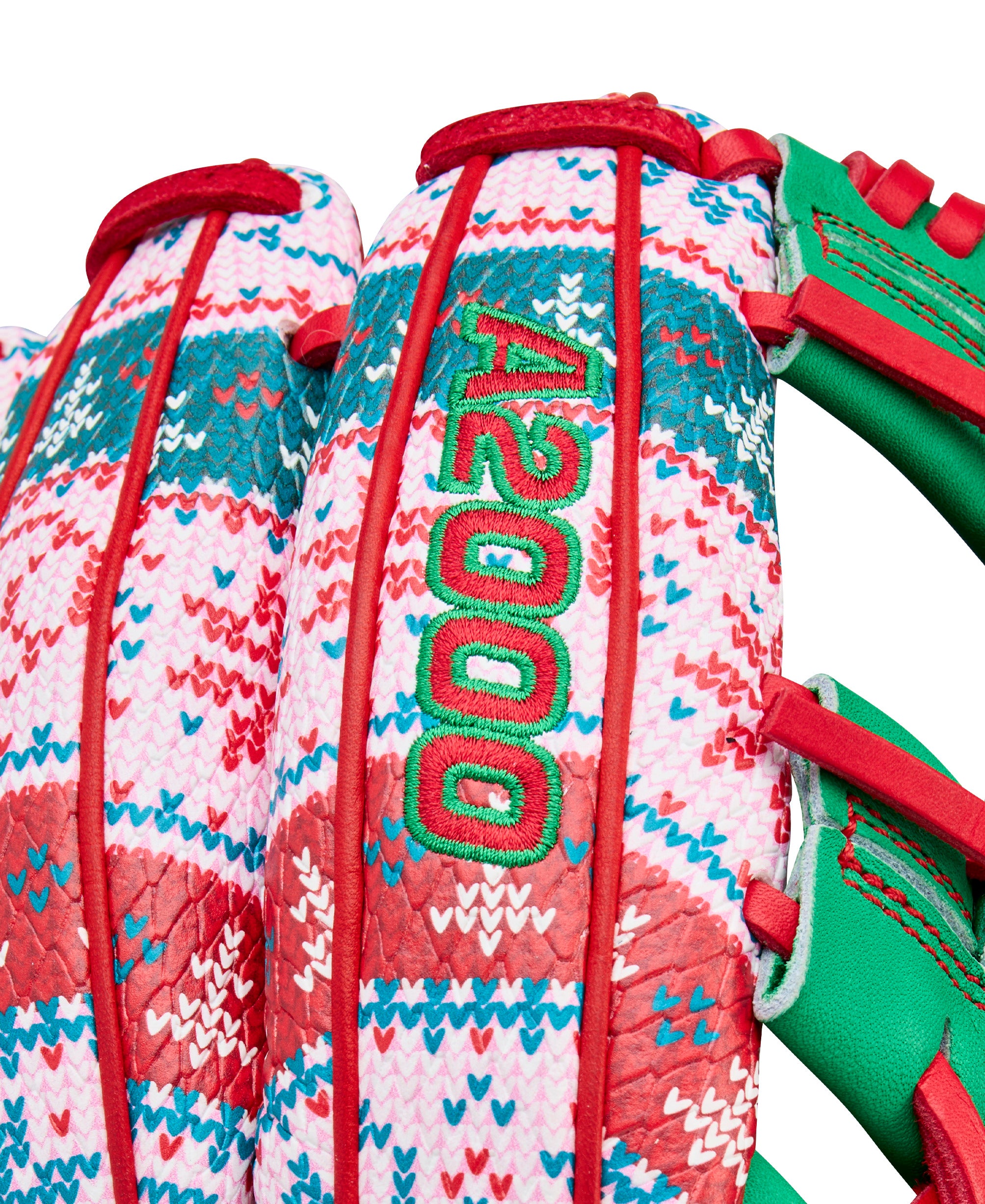 A2000 logo on finger of Wilson Glove of the Month (GOTM) December 2025 A2000 1975 Christmas 11.75" Baseball Glove embossed over the red-green pattern.
