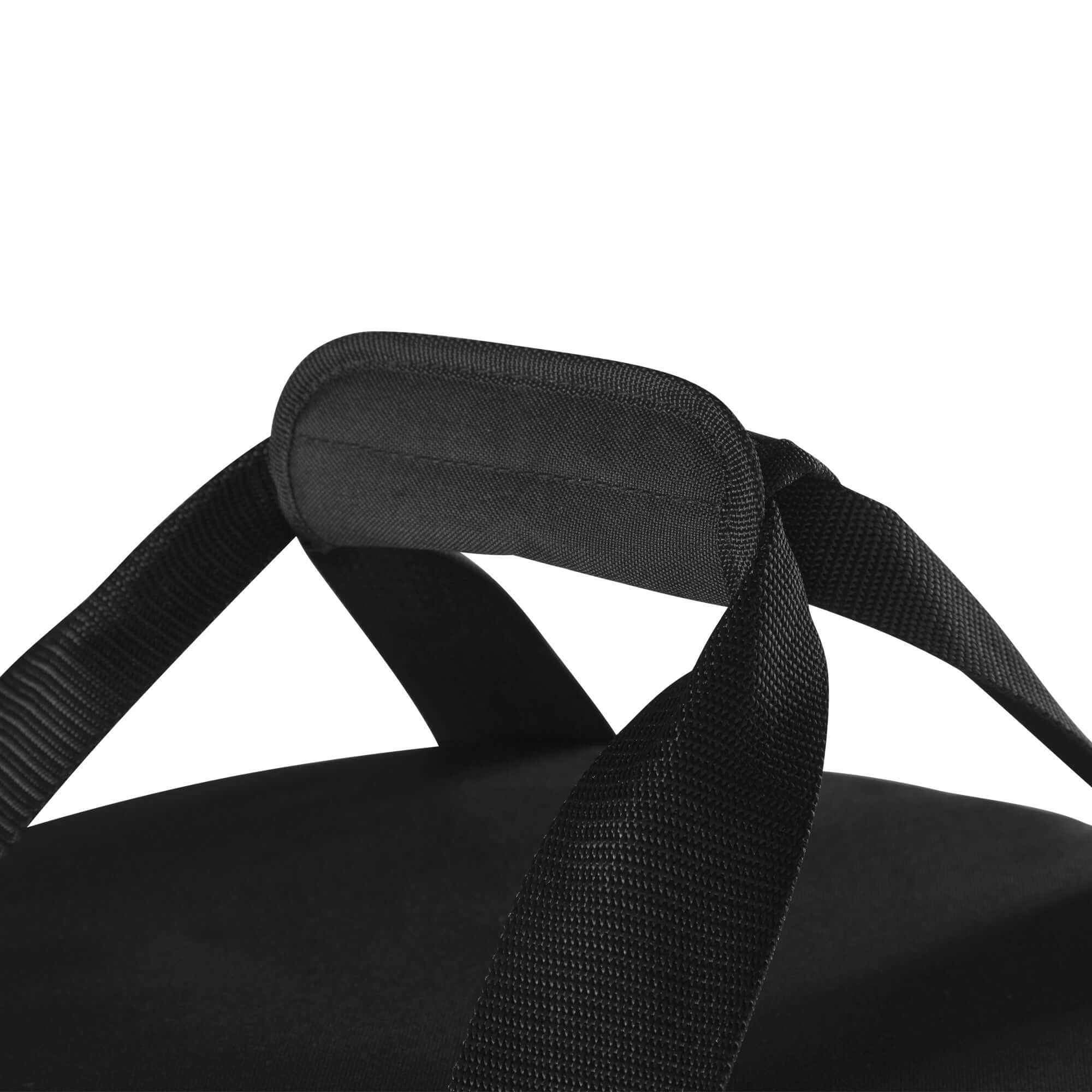 Close-up of the Evoshield Ball Bag's durable black handle for easy carrying during baseball or softball practice.