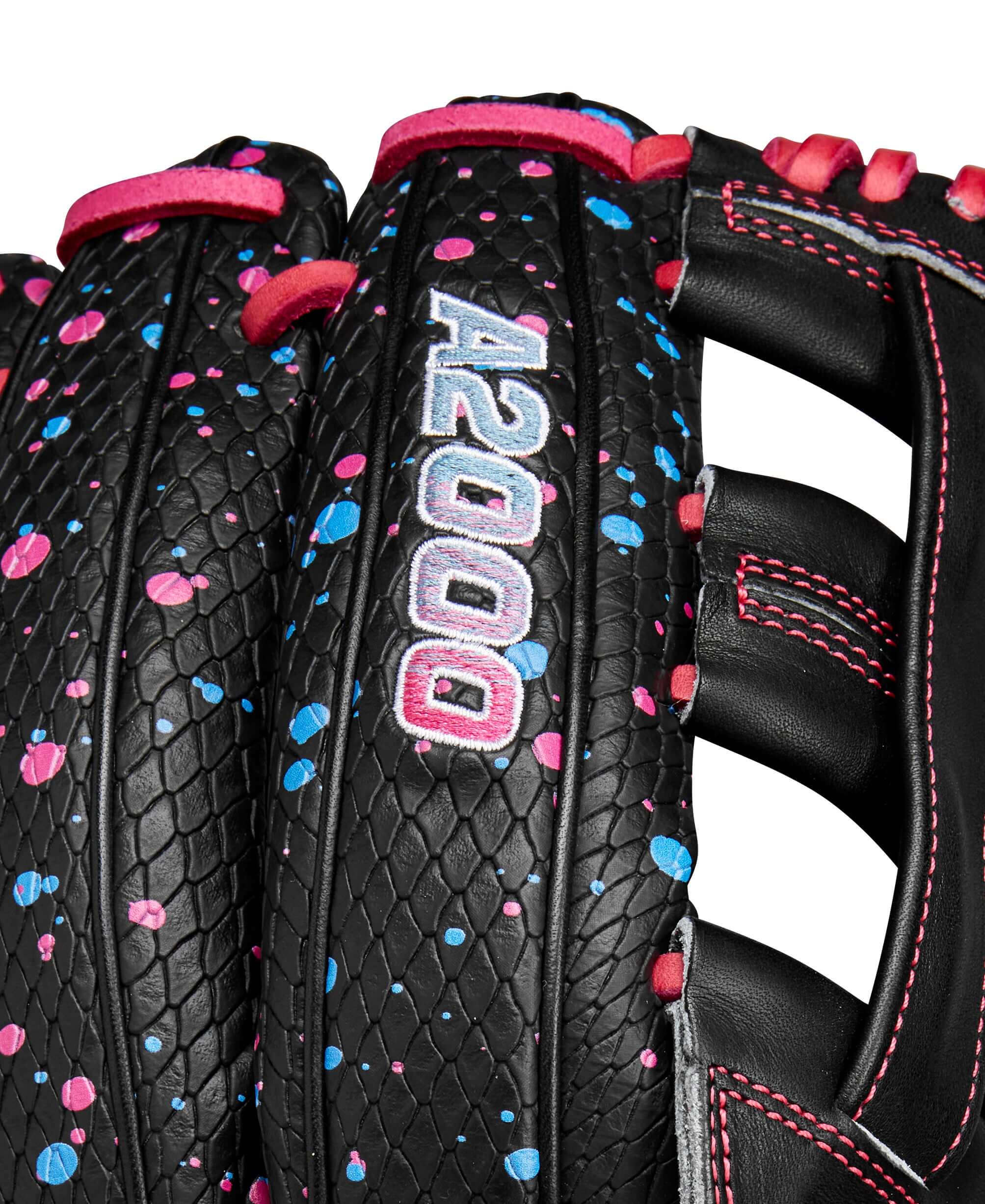 Close-up of the Wilson A2000 Elly De La Cruz 12" infield glove showcasing black design with pink and blue accents.