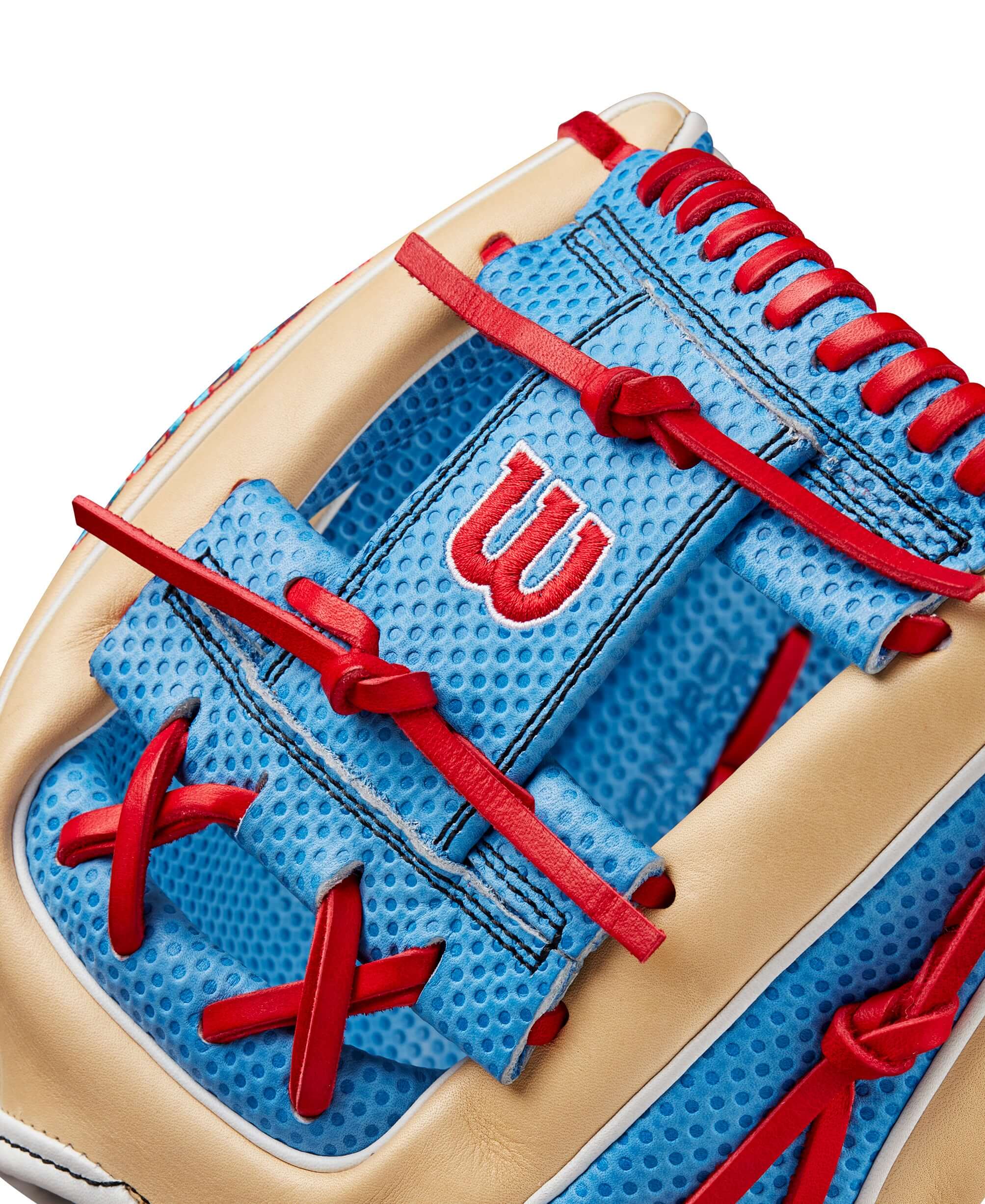 Close-up of Wilson A2000 1975 infield glove featuring Spin Control Technology in blue and blonde leather.