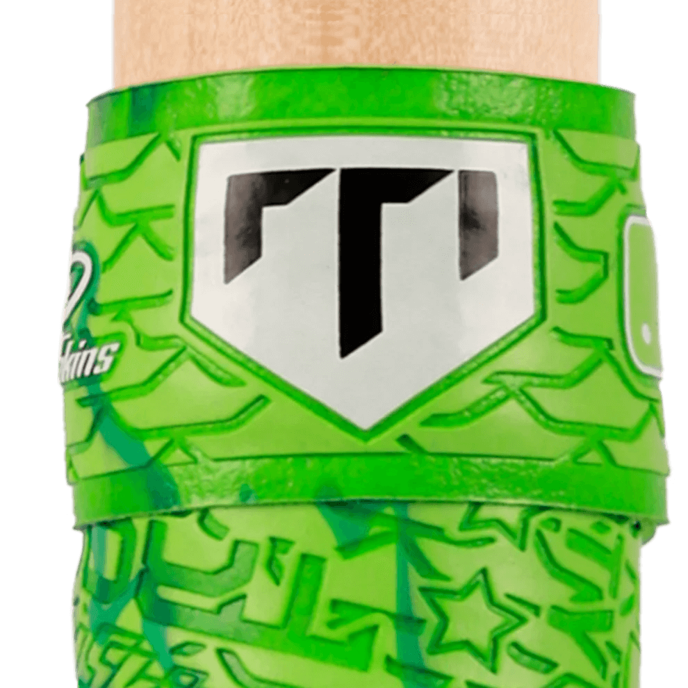 Close-up of Lizard Skins DSP Ultra Bat Grip - 0.5 mm in green with star pattern and logo detail.