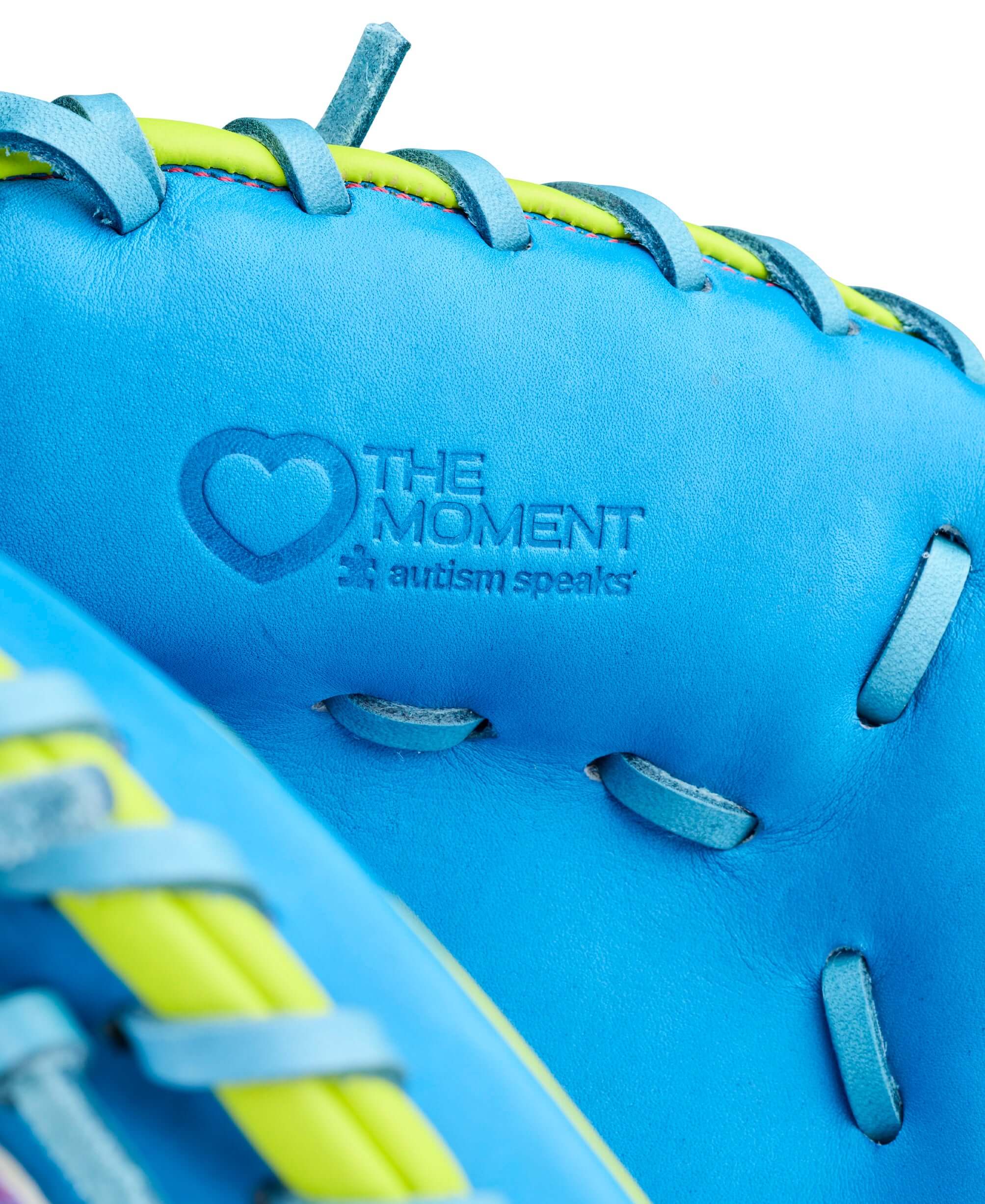 Close-up of the Wilson 2026 Love the Moment A2000 CM33SS 33” Baseball Catcher’s Mitt with blue lacing and Autism Speaks logo.