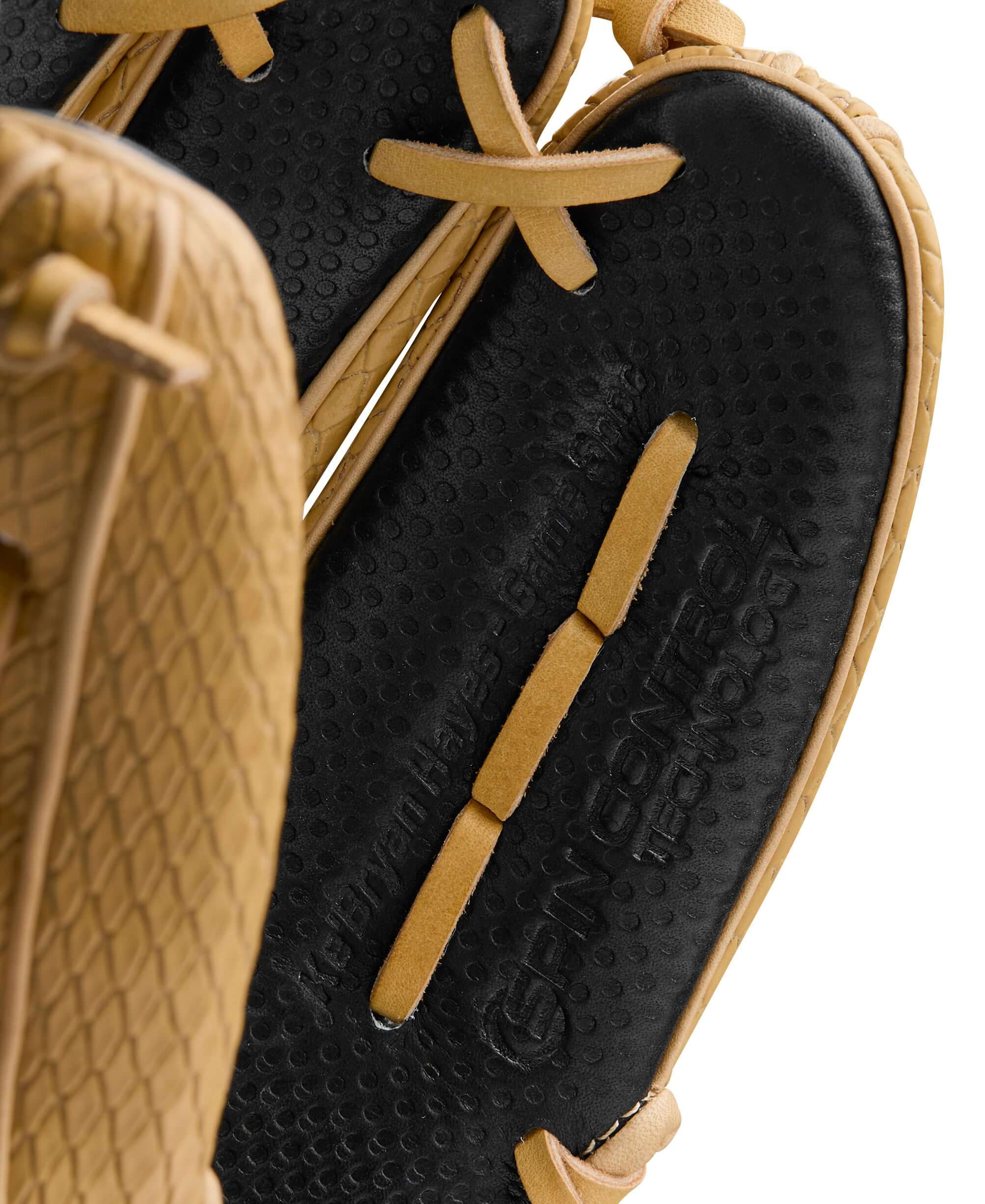Close-up of fingers area, highlighting the durable materials and textured SuperSnakeSkin™ pattern