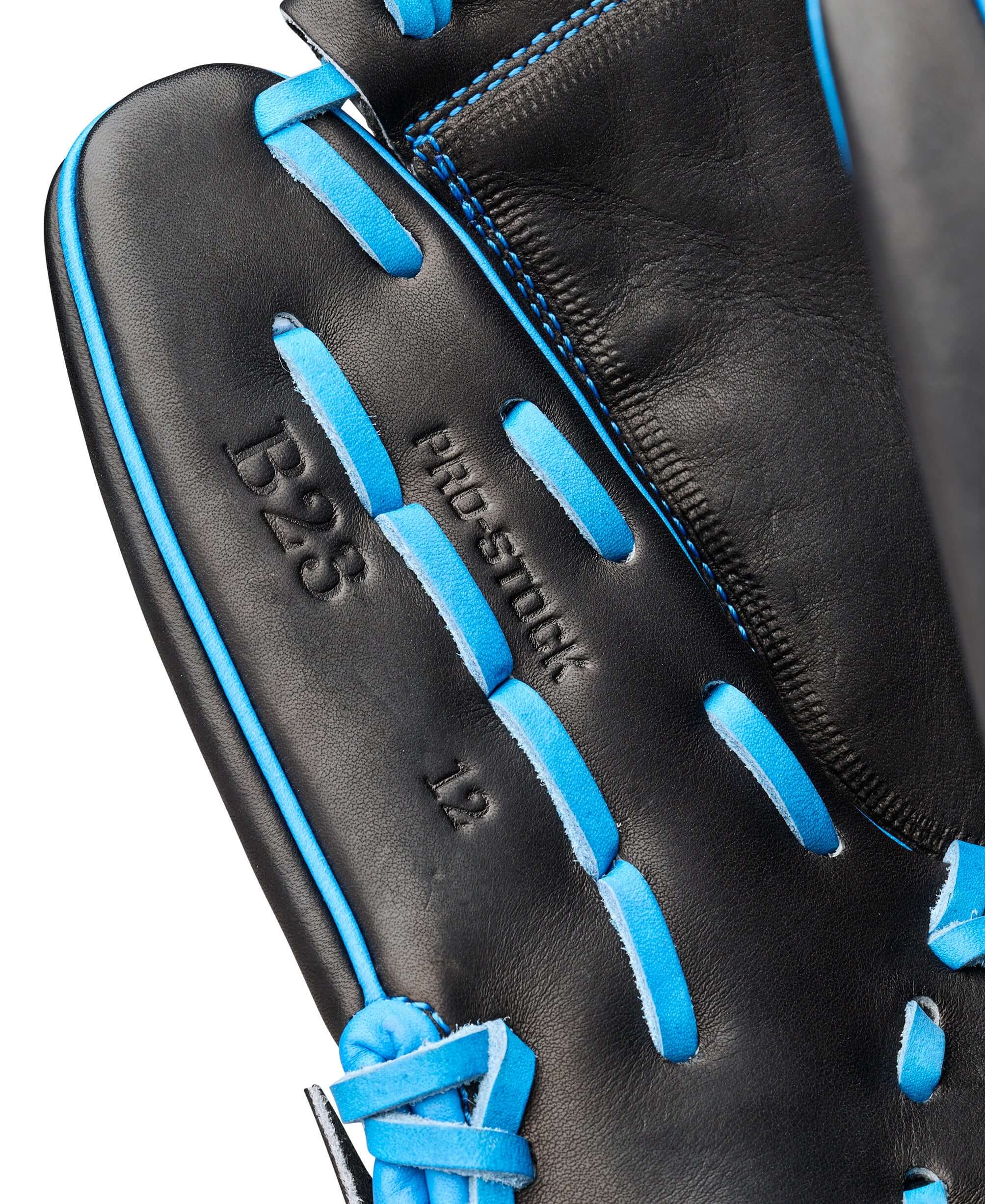 Wilson 2026 Love the Moment A2000 B23 Pitcher’s Glove palm view showing blue lacing and B23 stamp.
