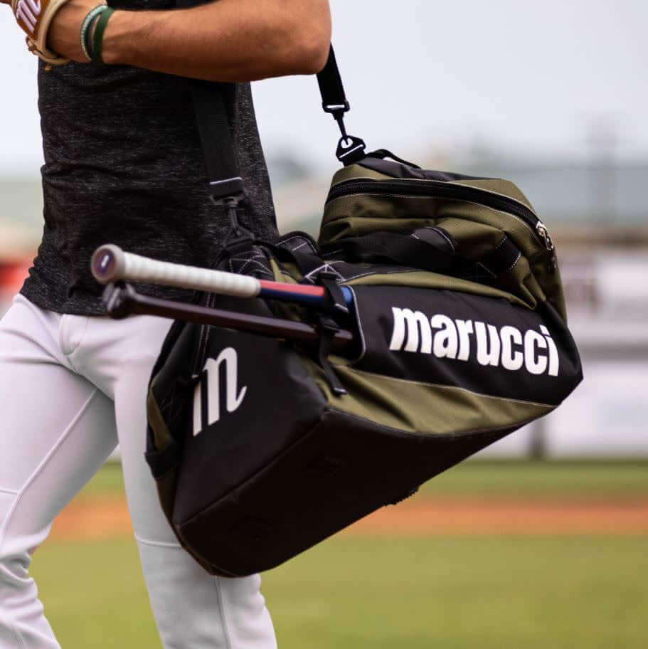Green Marucci Pro Utility Duffel Bag with bat sleeves and durable, water-resistant design.