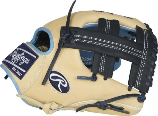 Rawlings Heart of the Hide 11.5-inch infield glove in camel, navy, and Columbia blue.