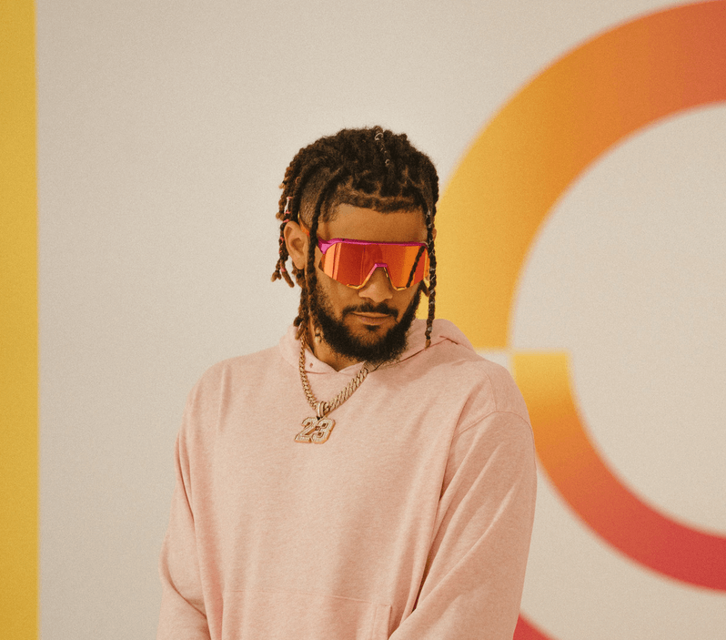 100% S3 Fernando Tatis Jr Special Edition glasses in metallic pink fading to yellow