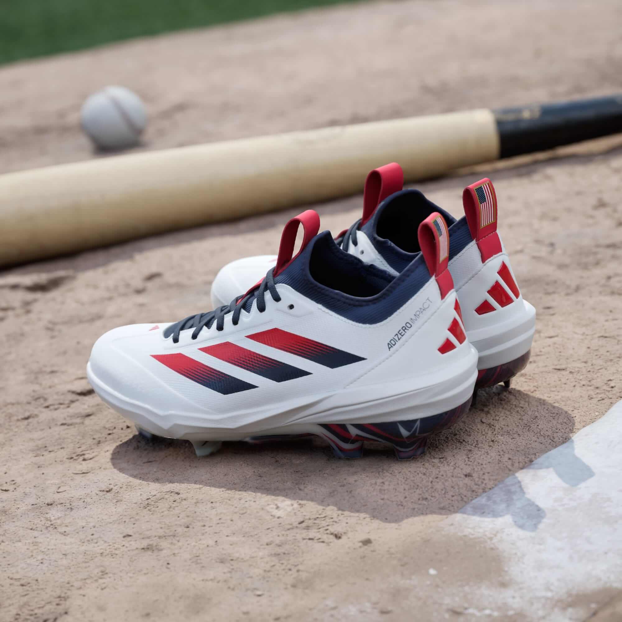 Adidas Adizero Impact TPU 2.0 USA Men's Baseball Cleats on baseball field, highlighting lightweight and responsive design for performance.