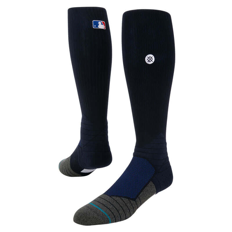 Stance MLB Diamond Pro OTC Socks in dark navy blue with MLB logo, designed for performance and comfort in baseball.