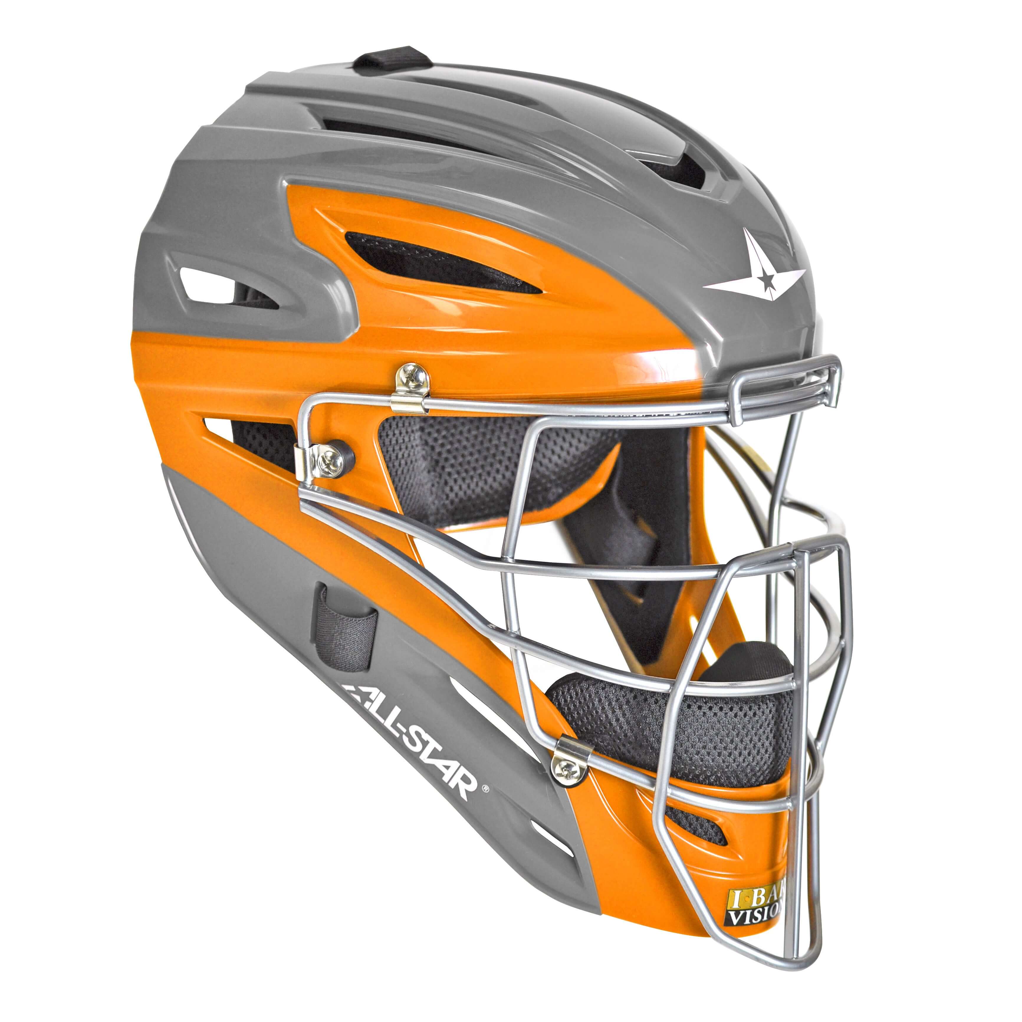 All-Star S7 AXIS catching helmet in two-tone orange and gray, designed for maximum vision and protection for ages 9-12.