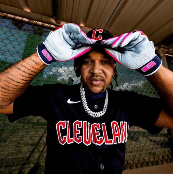 Franklin Jose Ramirez Limited Edition CFX Pro Youth gloves worn by player, showing palm view with pink lacing and logo.