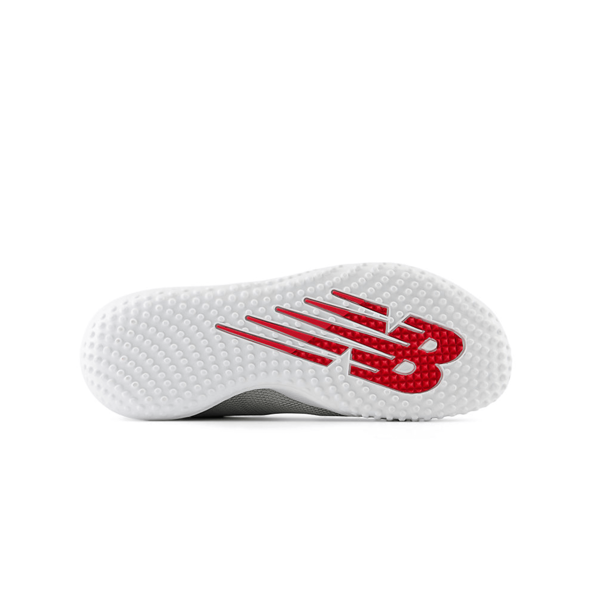 New Balance FuelCell 4040v7 Turf Trainer outsole design featuring red branding on a white rubber surface.