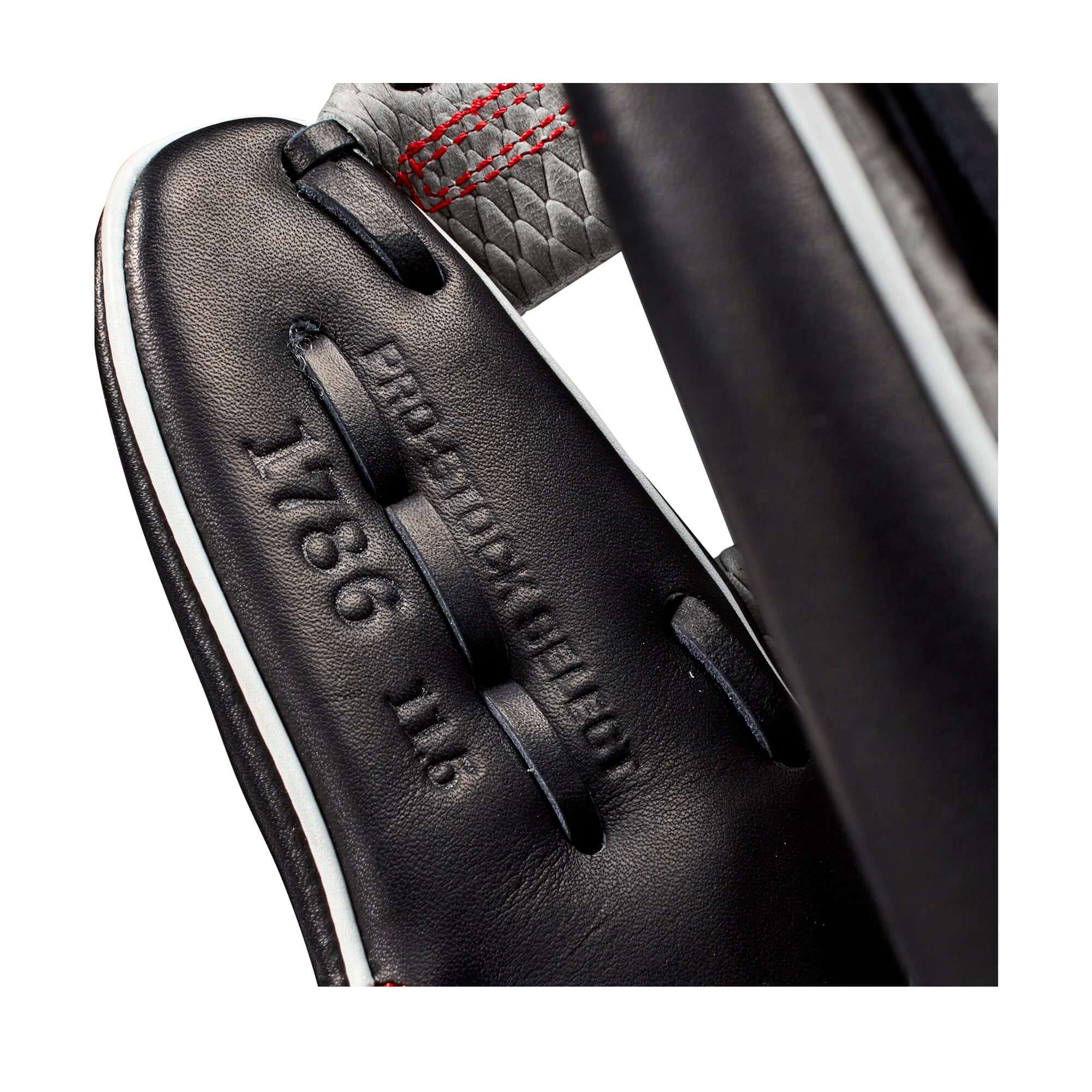 Close-up of the Wilson A2K 1786 glove interior showcasing the 1786 pattern and Pro Stock leather.