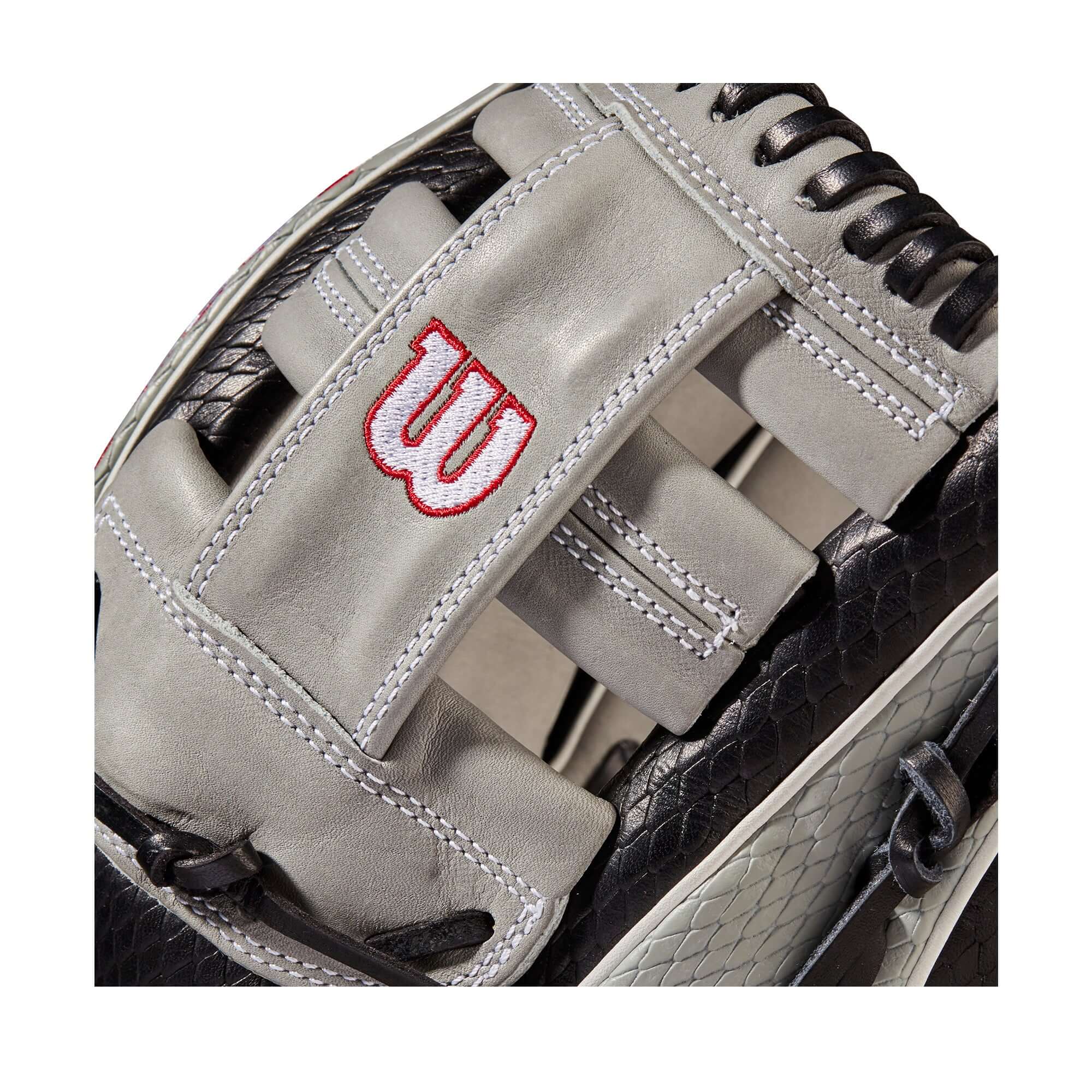 Black and grey Wilson A2000 SuperSkin glove with SuperSnakeSkin for reduced weight and moisture resistance.
