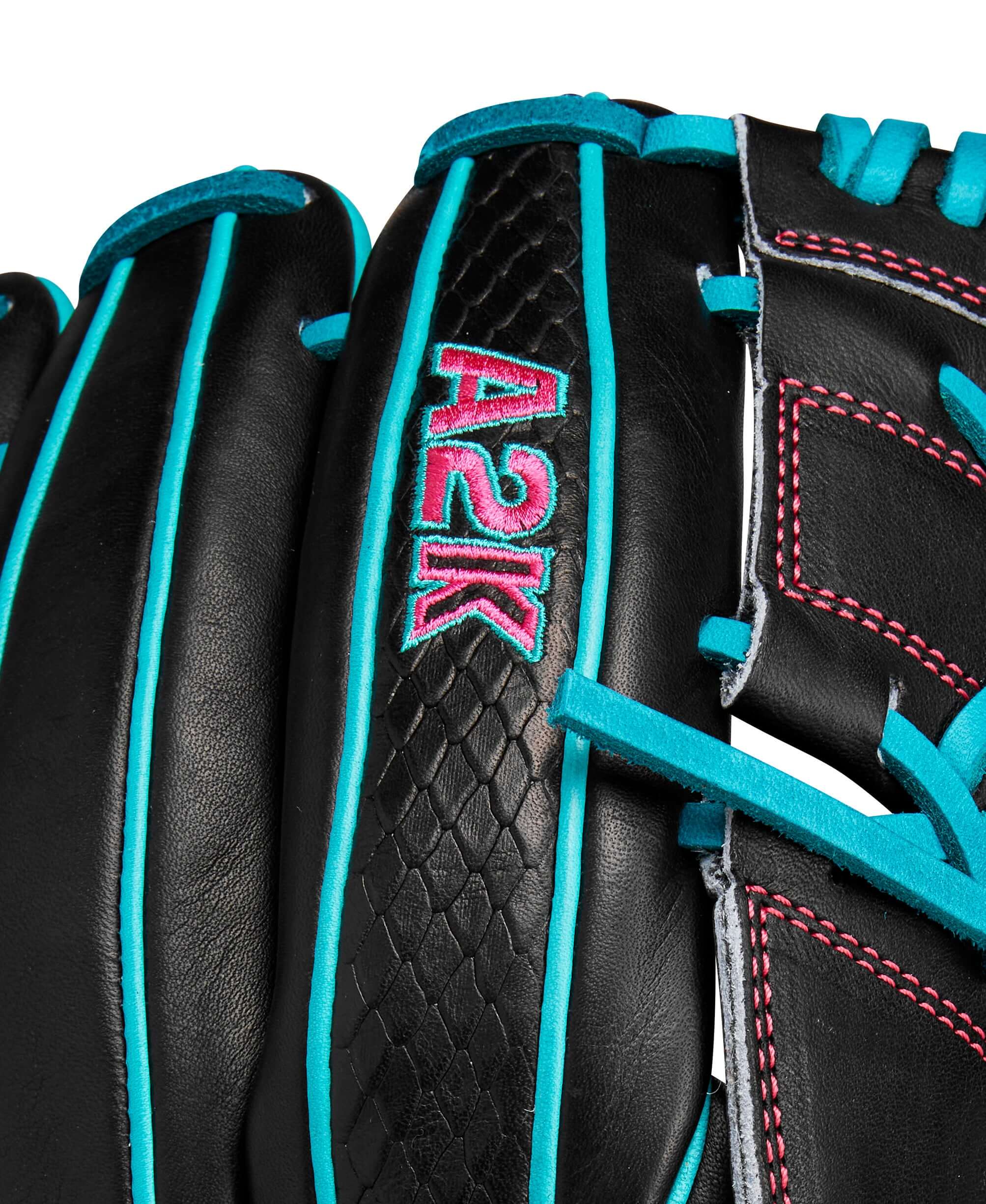 Close-up of Wilson A2K B2 pitcher's glove showcasing black leather with teal accents and vibrant stitching details.