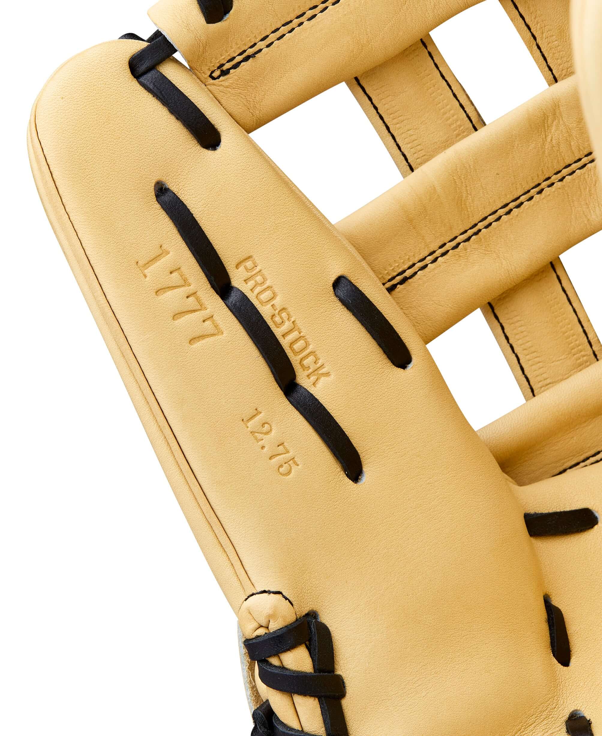 Thumb seam and leather texture of 2026 Wilson A2000 Classic Series 1777 12.75" Blonde glove showing craftsmanship.