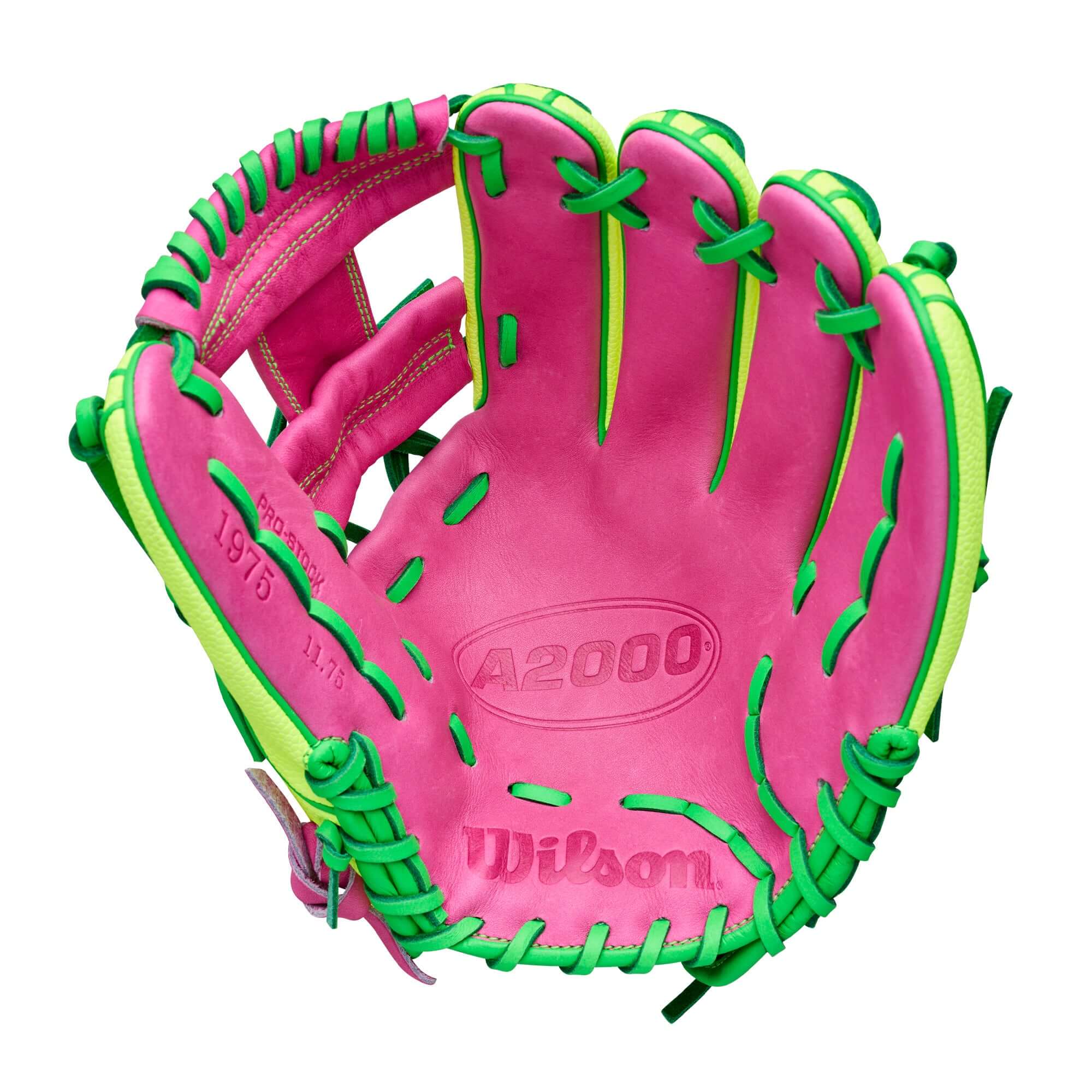 Wison A2000 March 2026 GOTM 1975SS Optic Yellow softball glove palm view, pink leather with green lacing and web details.
