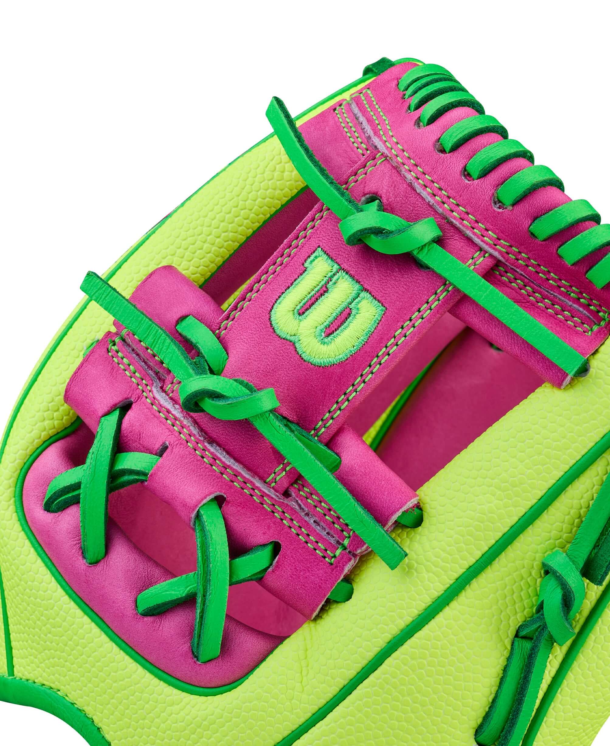 Wison A2000 March 2026 GOTM 1975SS Optic Yellow wrist opening with pink lacing and W logo detail.